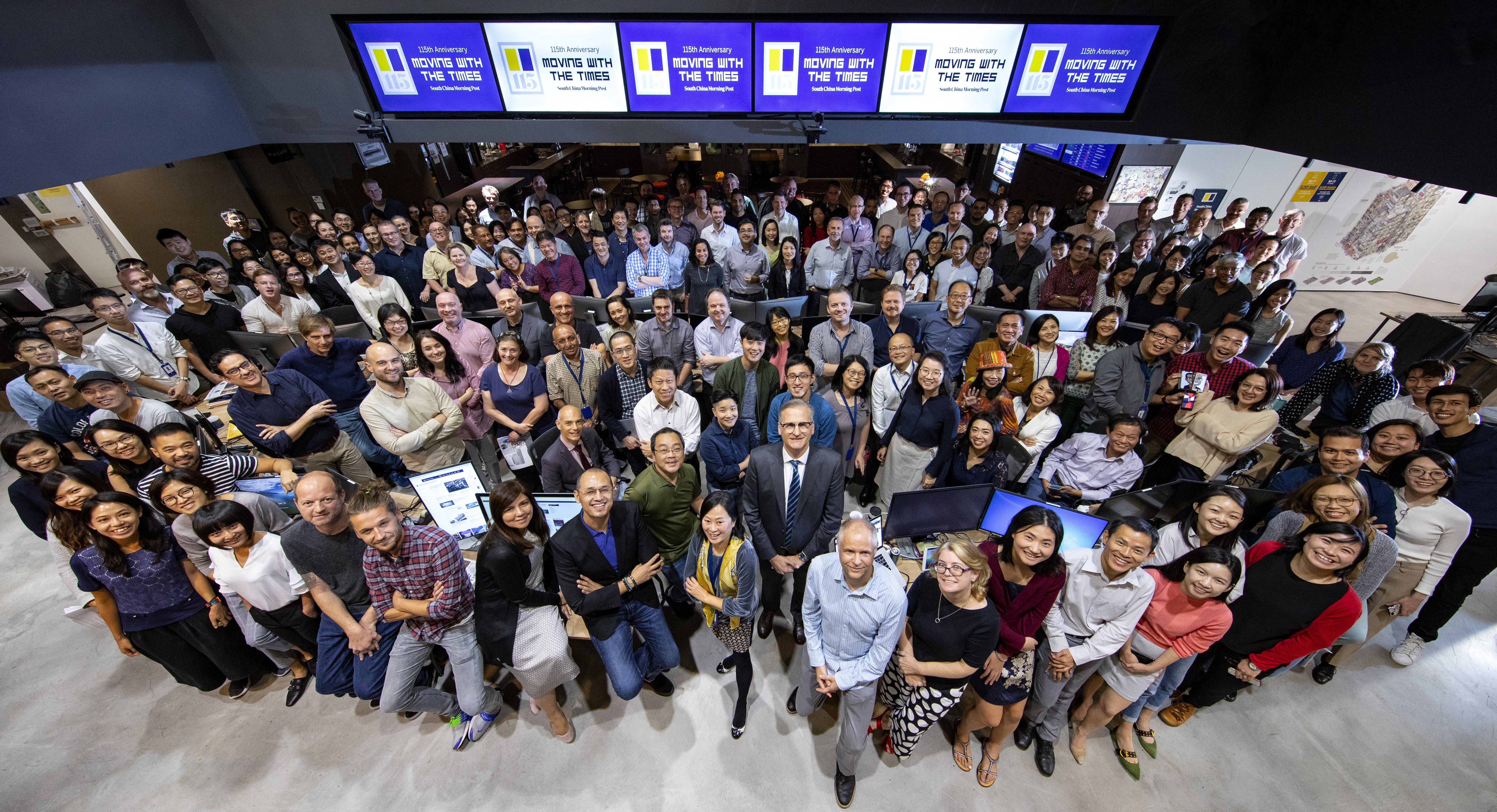 Editor-in-Chief Tammy Tam (centre) with members of the 24/7 newsgathering team at the South China Morning Post’s headquarters in Times Square, Causeway Bay. Photo: Dickson Lee 