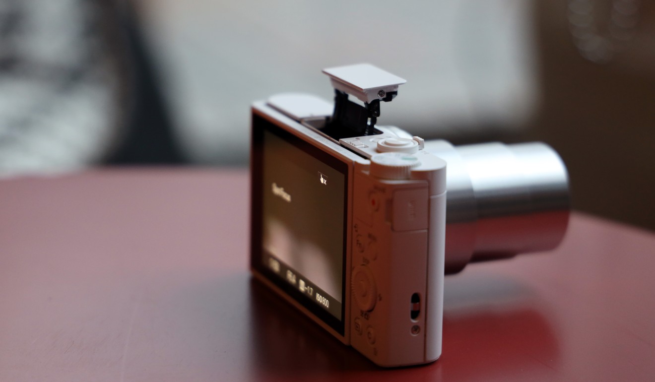 Pocket-sized Sony DSC-WX800 digital camera's zoom lens packs a big