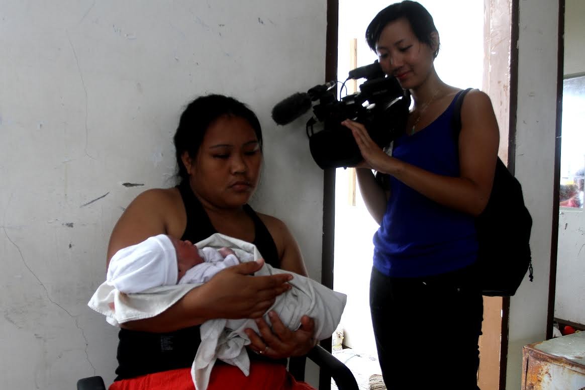 AFP video journalist Agnes Bun films the miraculous story of baby Bea Joy, who was born in the wake of Typhoon Haiyan five years ago.