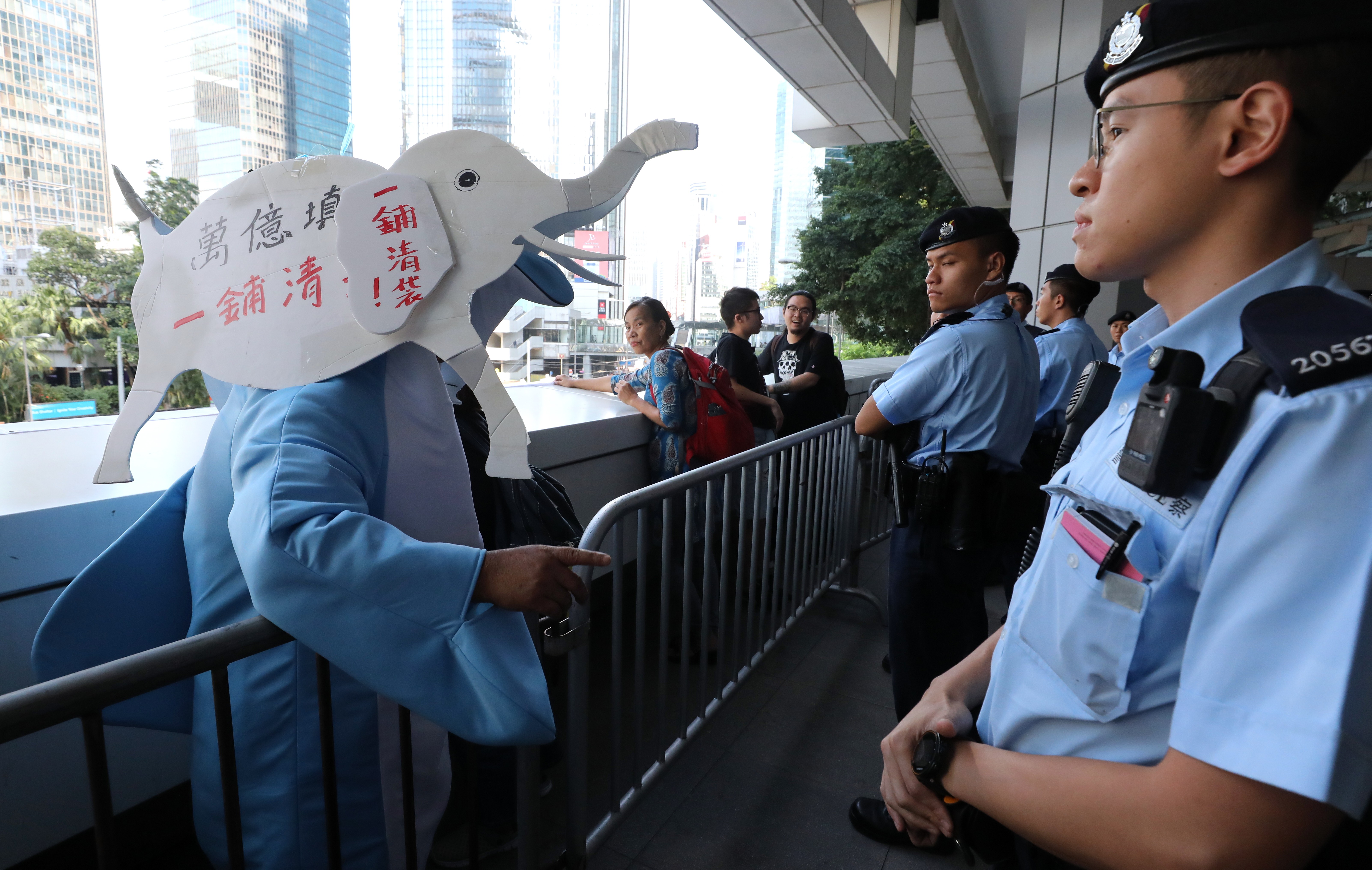 A protester dressed as a white elephant in protest against the Lantau Island reclamation scheme at government headquarters in Admiralty. Photo: Felix Wong