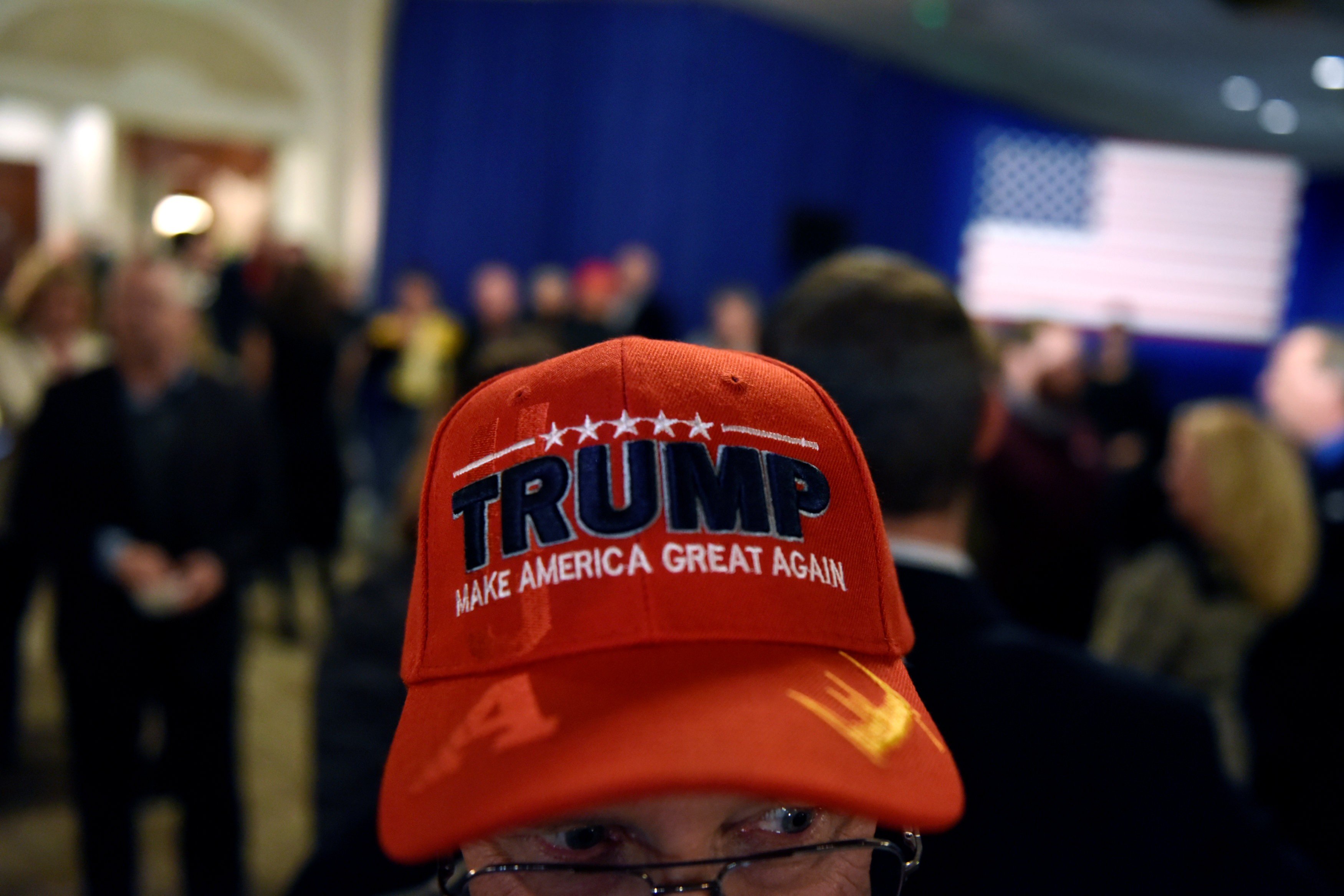 A Donald Trump supporter attends the election night party of Wisconsin’s Republican governor Scott Walker, who was narrowly defeated by Democrat Tom Evers in a race seen as a key test of partisan control in the Midwest. The Democrats may have regained the majority in the House of Representatives, but the Republican Party is now Trump’s to direct. Photo: Reuters