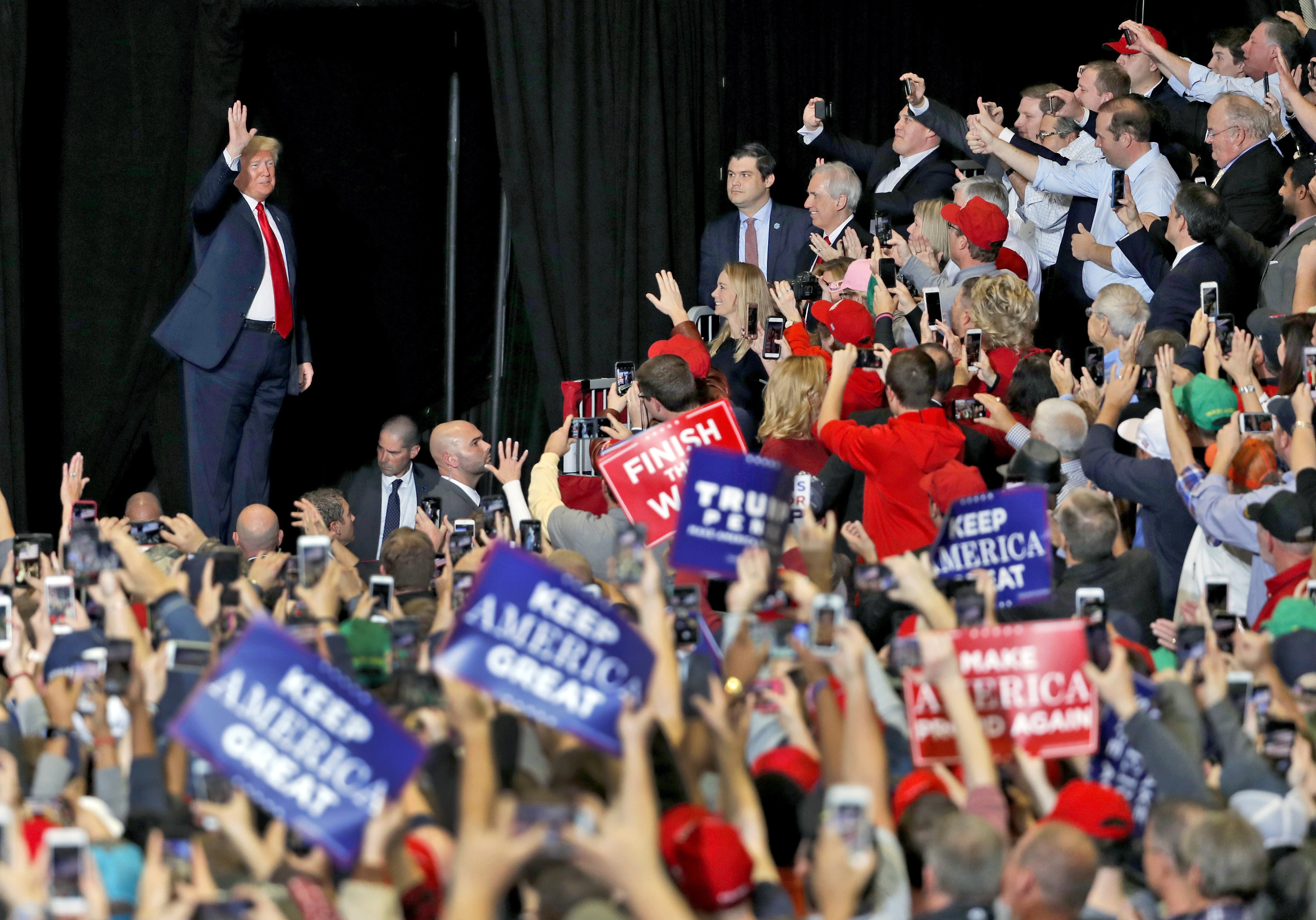 President Donald Trump waves to supporters after being introduced during a campaign rally on November 5 in Cape Girardeau, Missouri. Photo: AP