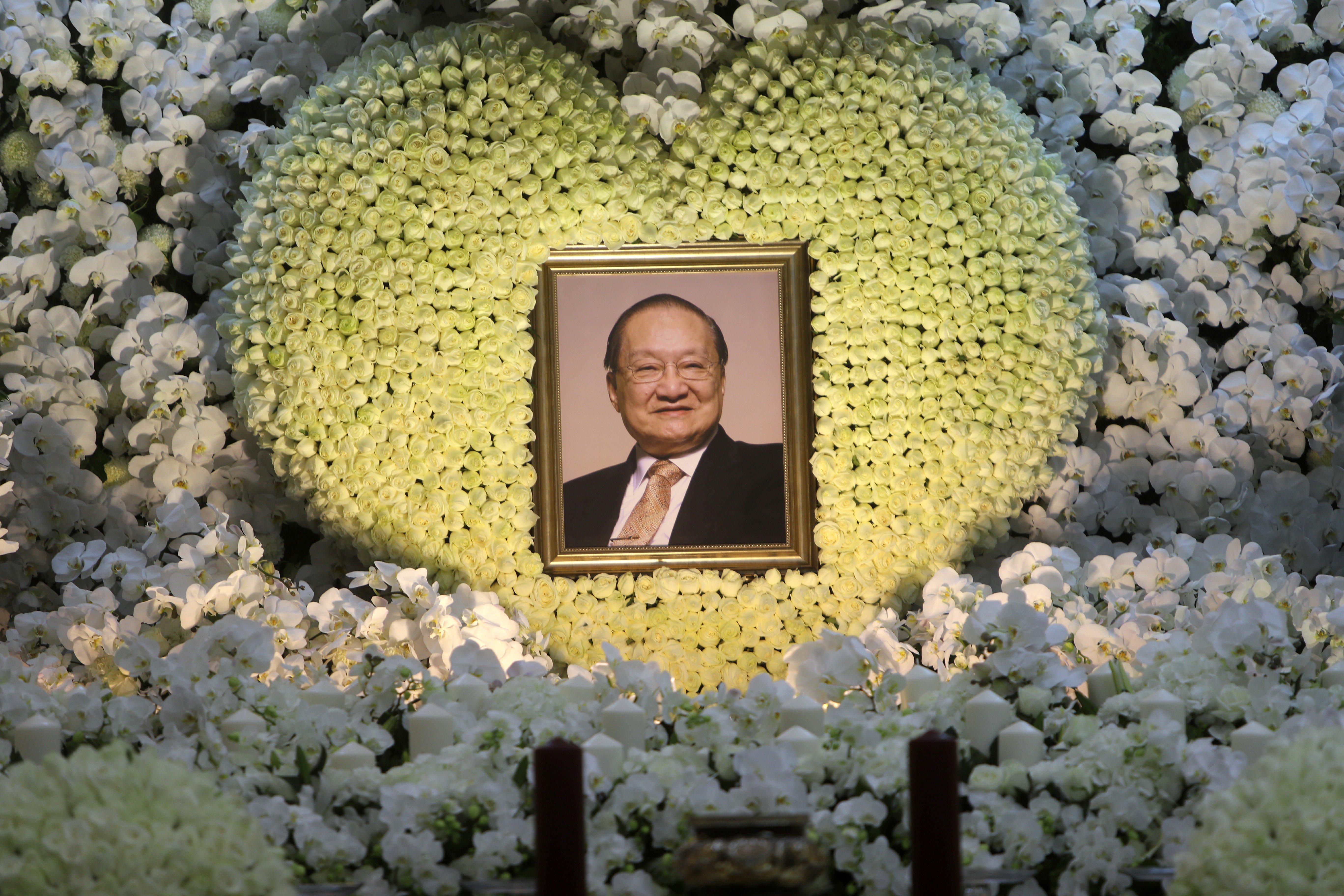 Floral wreaths at a private service for novelist Louis Cha at the Hong Kong Funeral Home in North Point. Photo: Winson Wong/SCMP