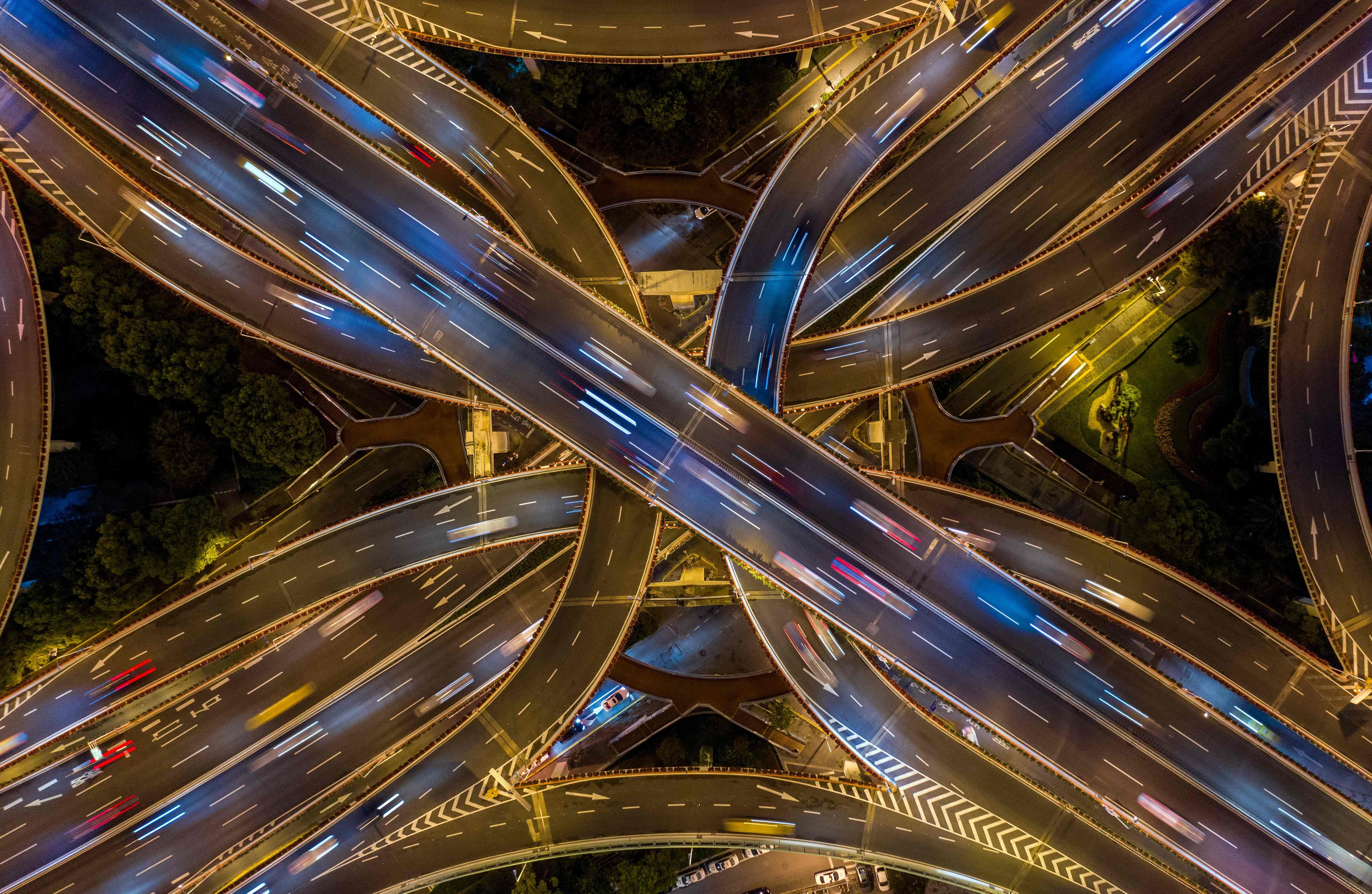 An aerial view of traffic in downtown Shanghai. The Chinese government is adapting quickly and quietly to blockchain, knowing that it can accelerate the next financial revolution. Photo: AFP