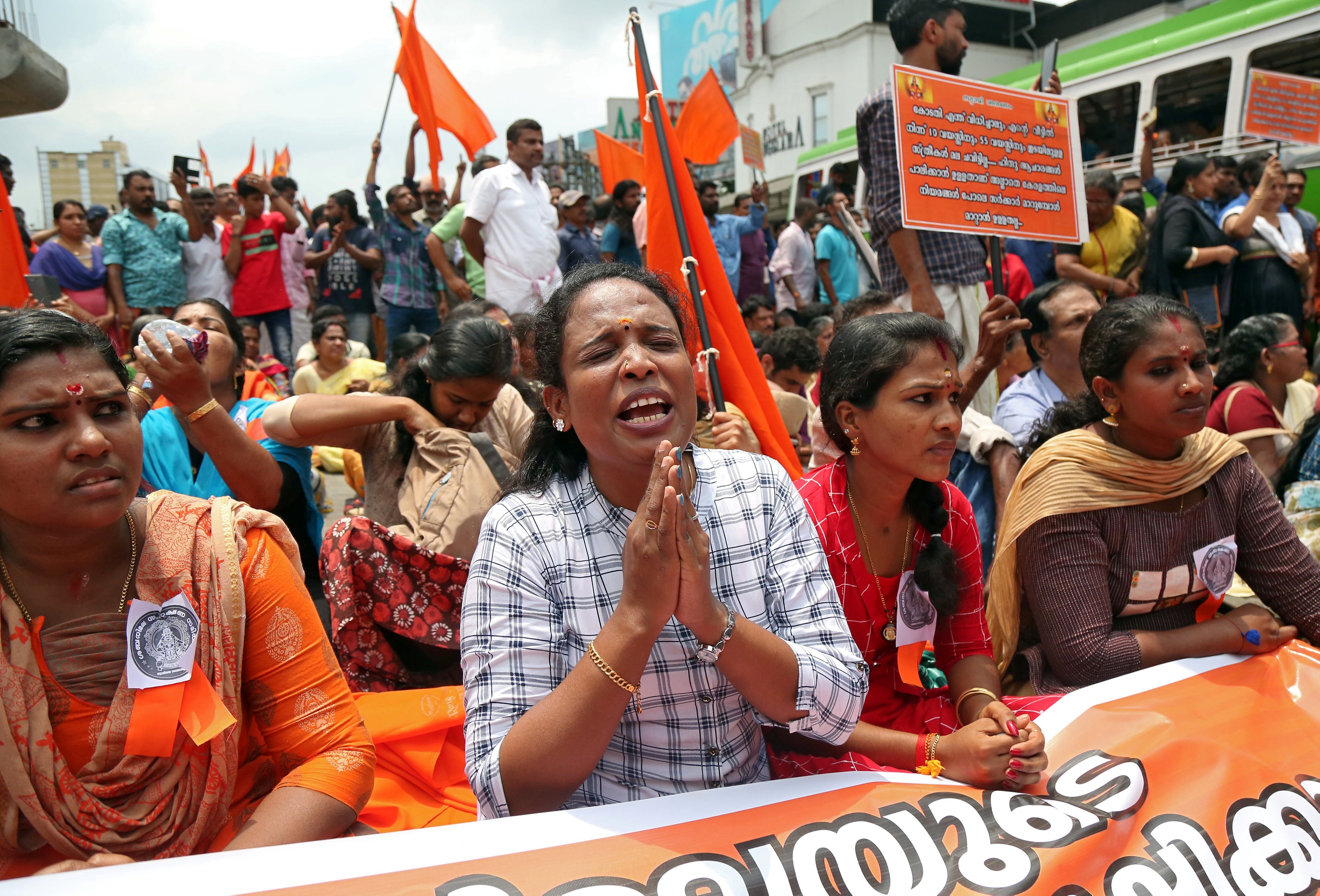 A woman chants hymns during a protest called by various Hindu organisations against the lifting of a ban preventing women of menstruating age from entering the Sabarimala temple in India. Photo: Reuters