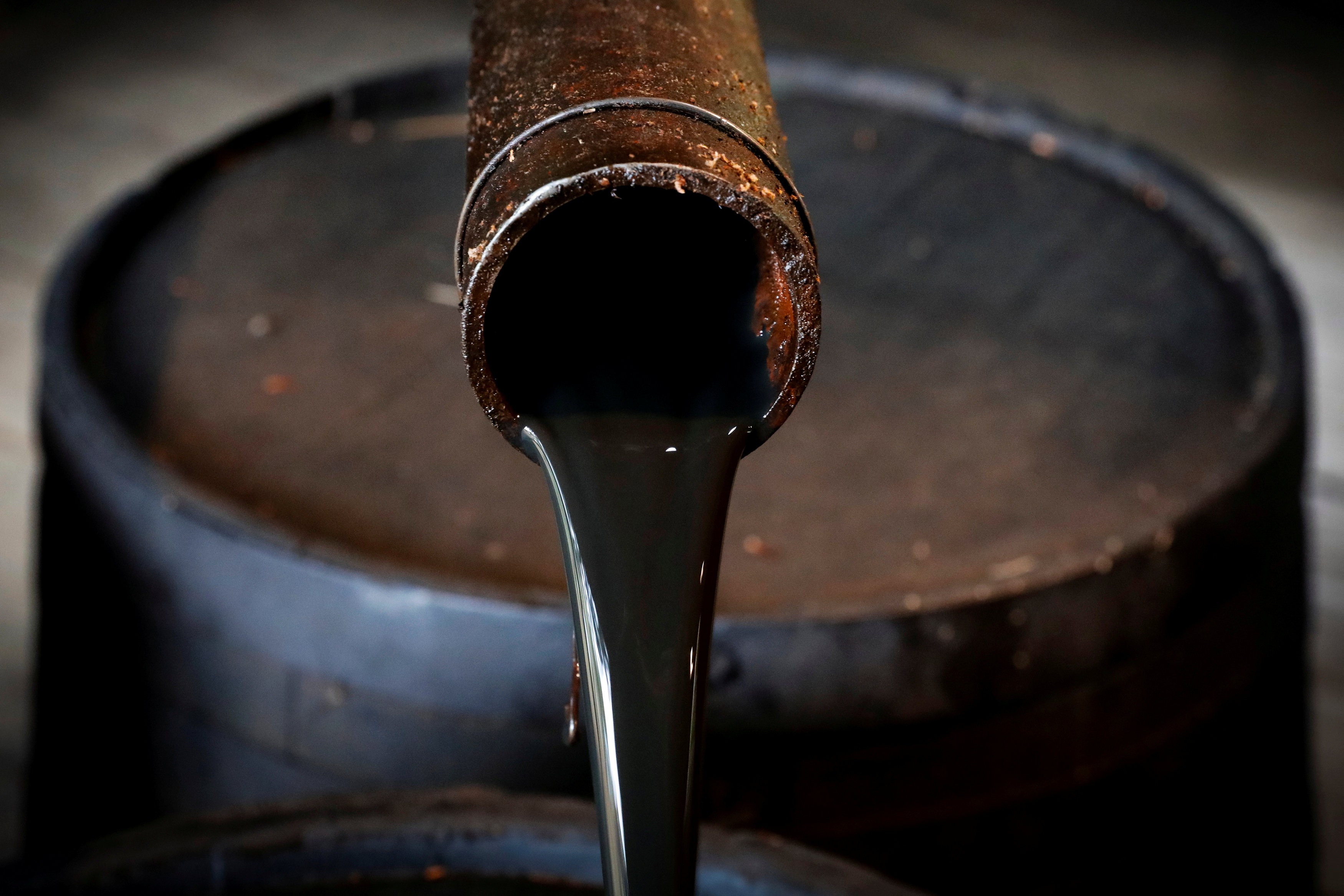 Oil pours from a spout at Edwin Drake’s original 1859 well that launched the modern petroleum industry at the Drake Well Museum and Park in Titusville, Pennsylvania, US. The factors driving lower oil prices in October and November are likely to fade as supply constraints bite. Demand remains solid and is likely to hold up as global growth continues. Photo: Reuters