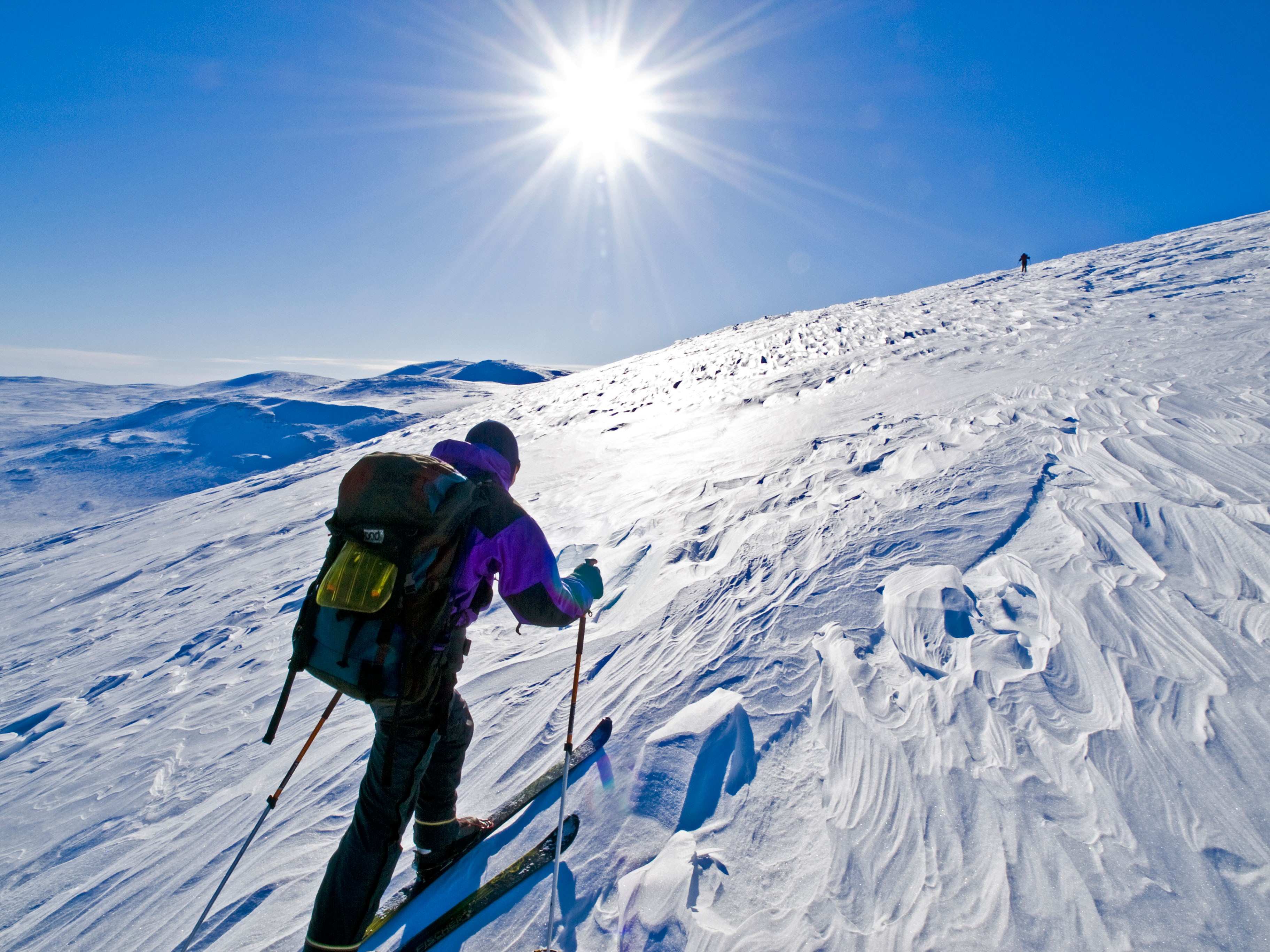A ski tourer makes his way up a mountain in northern Norway. Photo: Alamy