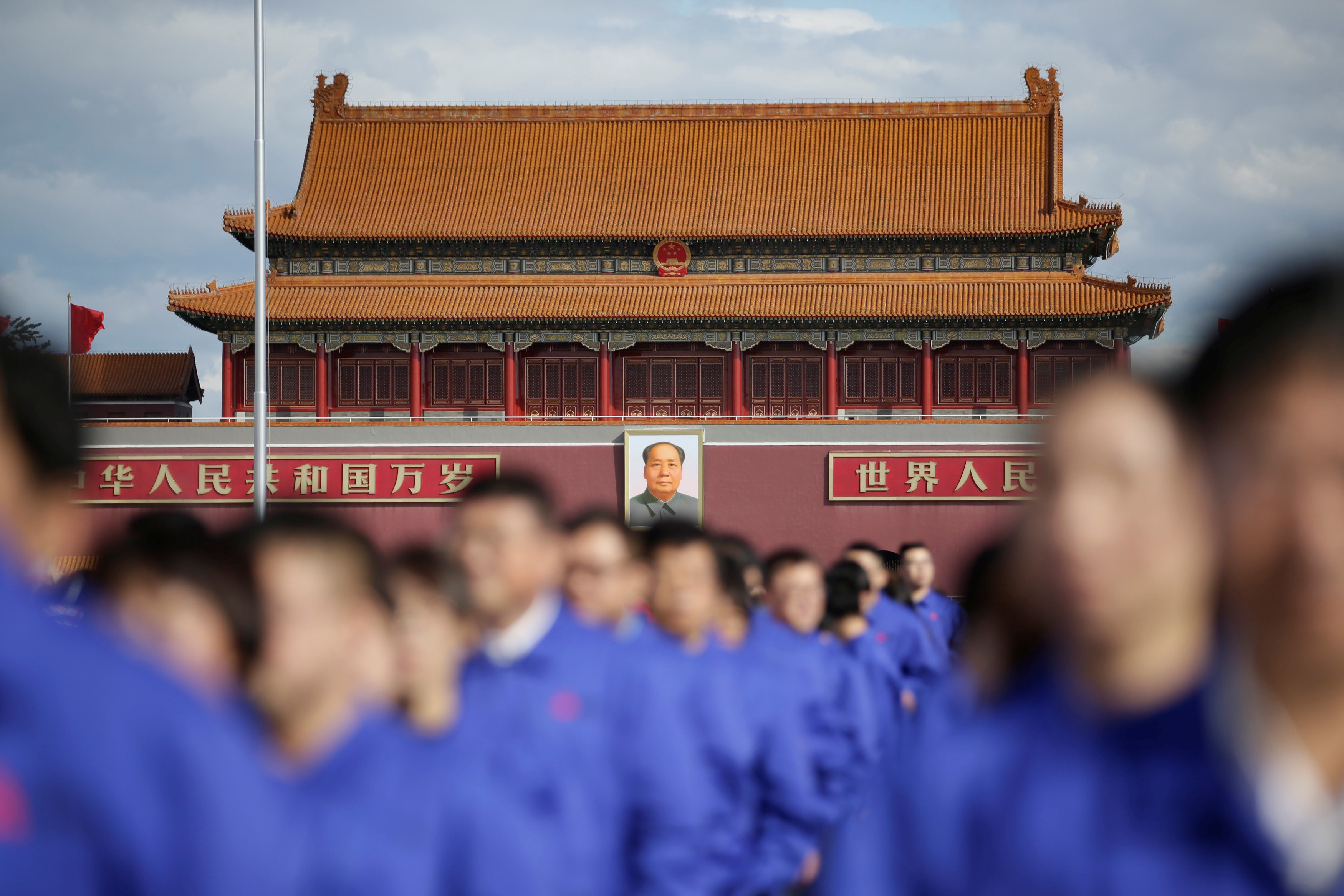 Workers attend a ceremony to mark the 69th anniversary of the founding of the People’s Republic of China on September 30 in Tiananmen Square. Can the Chinese Communist Party continue to produce leadership that’s adequate to the challenges China faces? Photo: Reuters