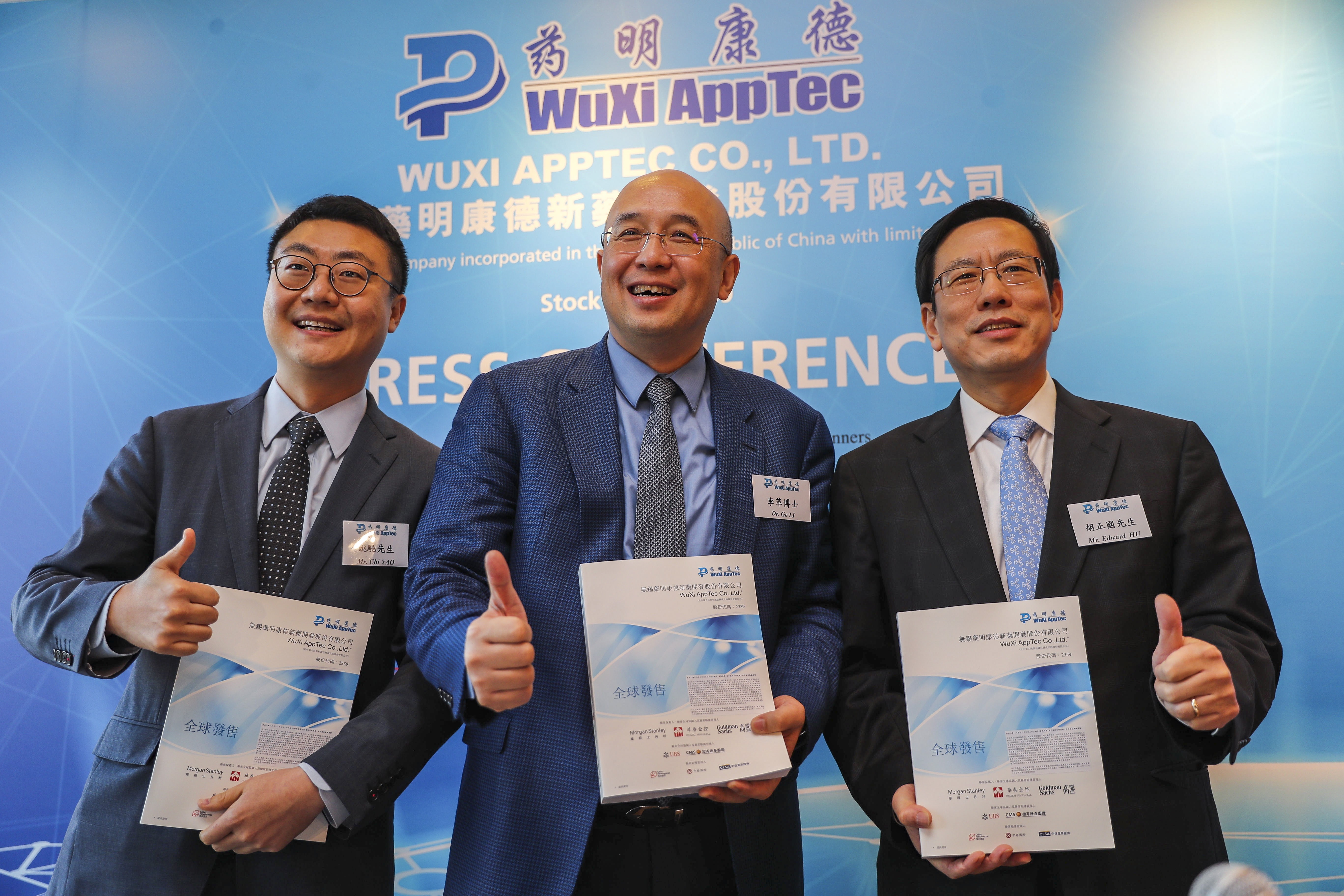 (From left): Wuxi AppTec board secretary Chi Yao, chairman Li Ge and CFO Edward Hu, at the company’s press conference to announce its Hong Kong IPO, on Friday. Photo: Edward Wong