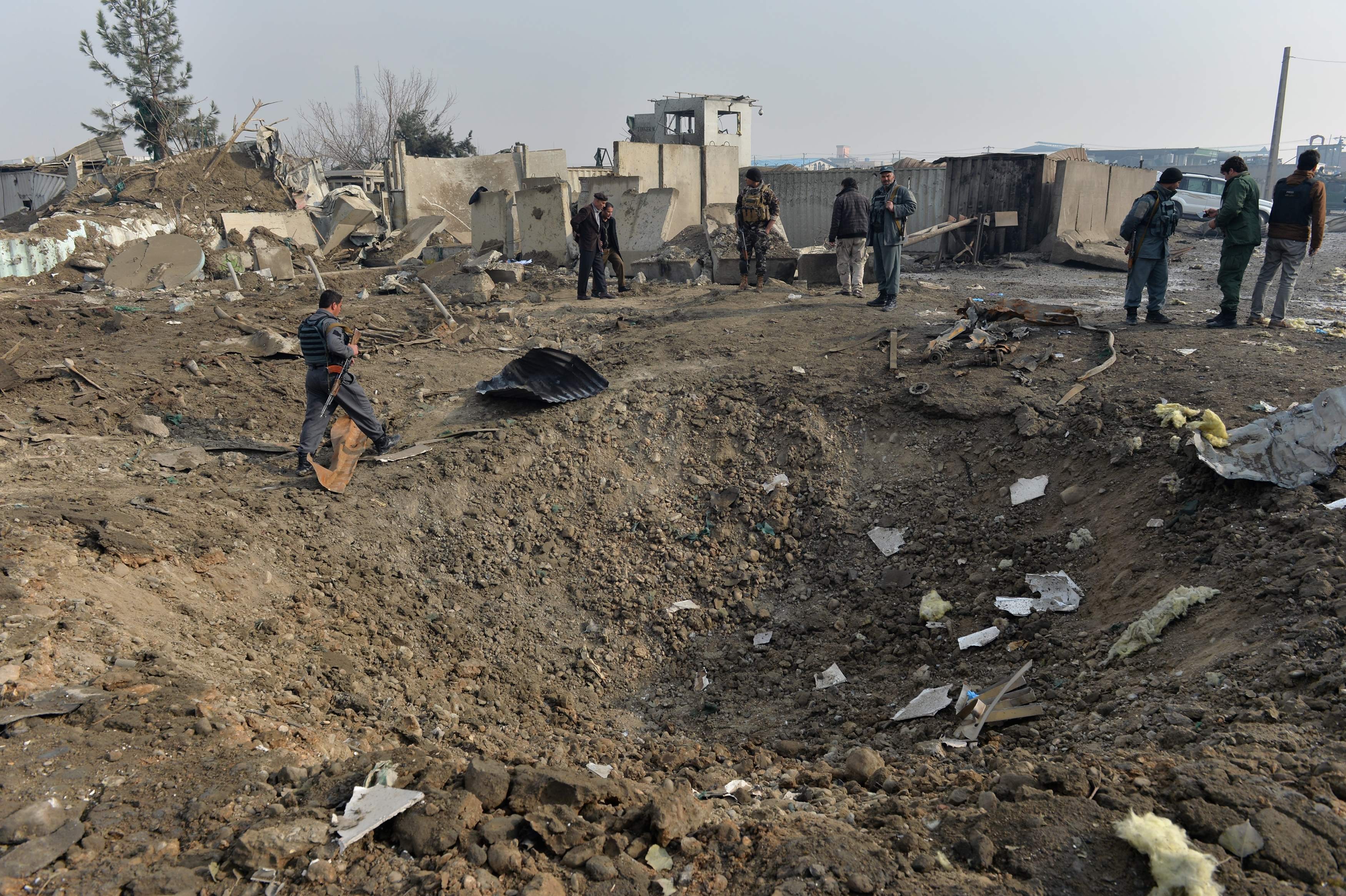 Afghan security forces gather at the site of a suicide bomb attack in Kabul, Afghanistan last month. Photo: AFP