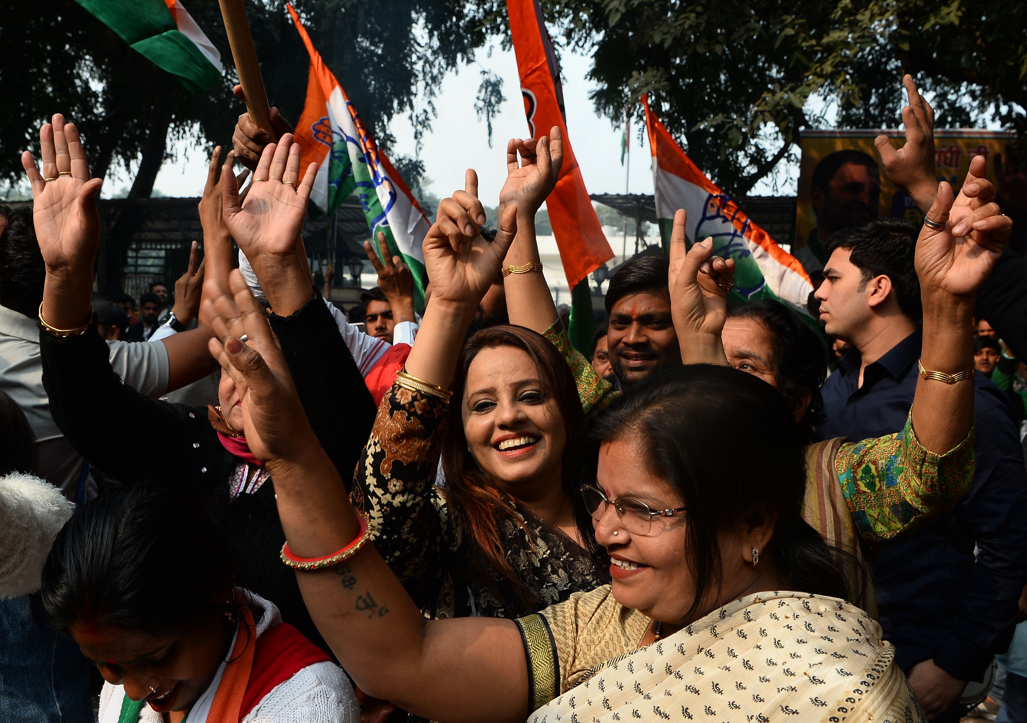 Indian National Congress supporters celebrate outside the party headquarters in New Delhi. Photo: AFP