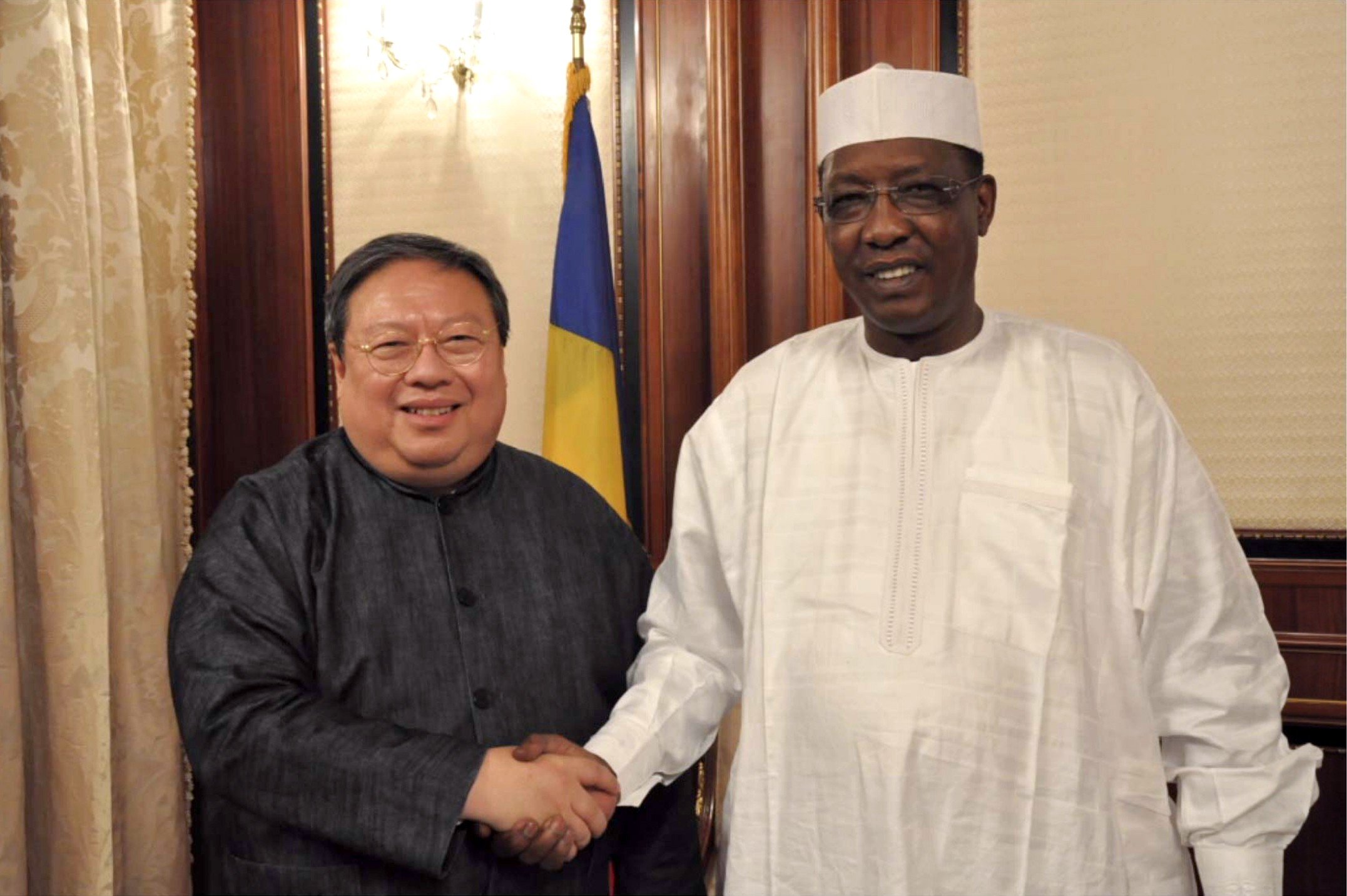 Patrick Ho led a CEFC Chinese Energy delegation to meet Chadian President Iris Deby in November 7, 2014. One month later in the second visit, Ho brought along eight boxes stuffed with cash. Photo: Handout