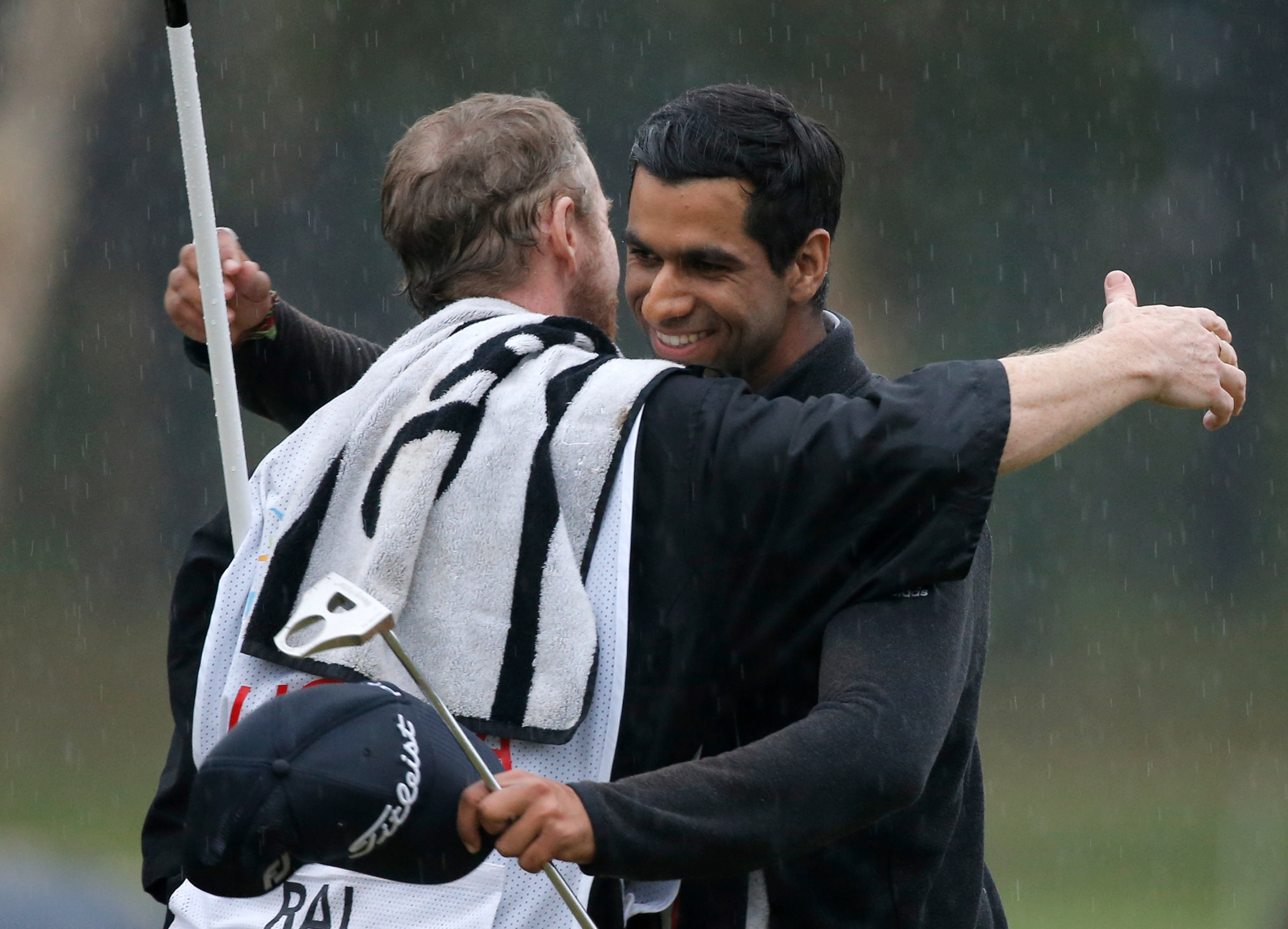The incredible story of how a local brewer and amateur caddie ended up accompanying pro golfer Aaron Rai during his first European Tour triumph. Photo: AFP