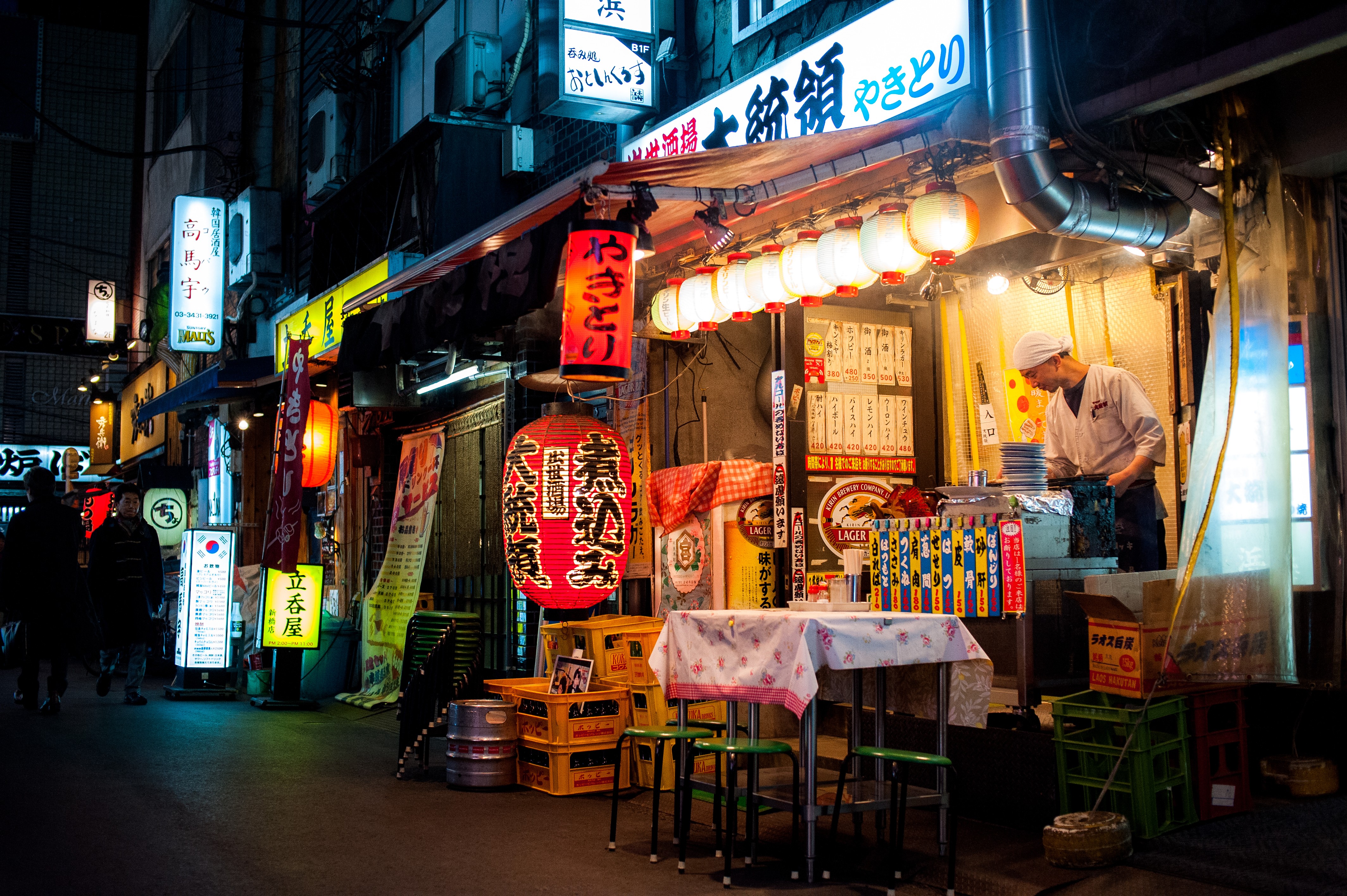 A yakitori chef works at his grill in a back street of Shinbashi district in Tokyo. Photo: Lukasz Palka