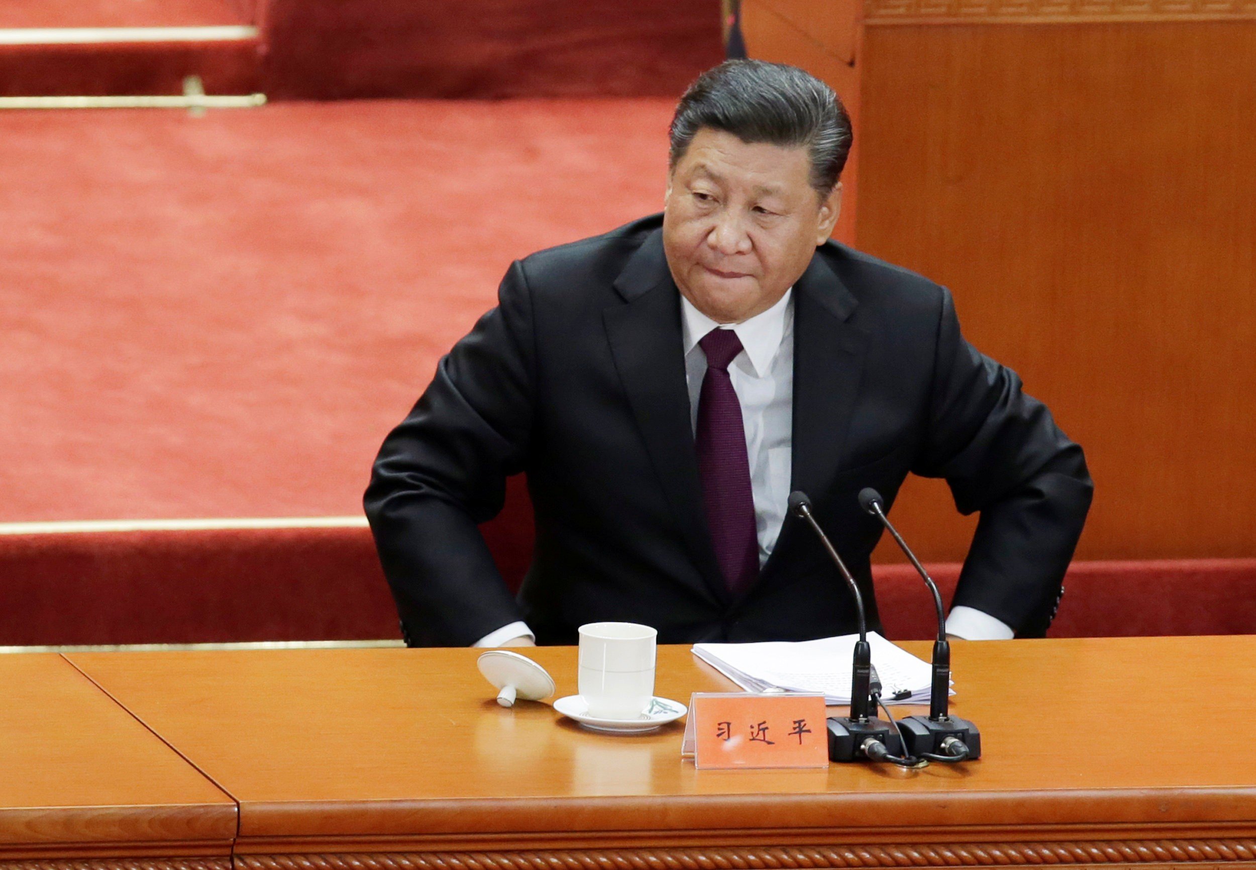 President Xi Jinping prepares to leave at the end of the event in Beijing marking the 40th anniversary of China’s reform and opening up. Photo: Reuters