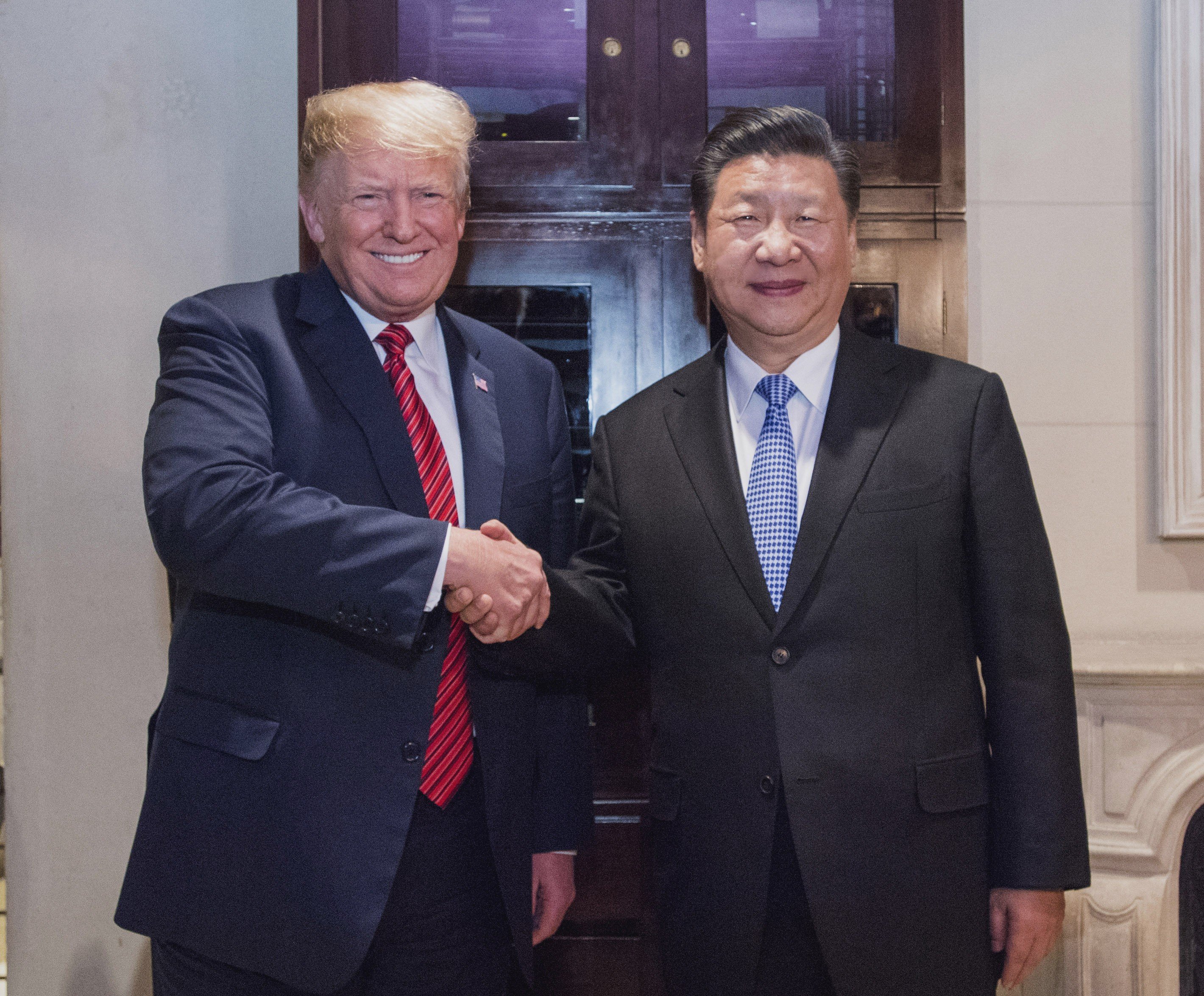 It might not seem like it, but there could be something to smile about regarding the US-China trade war. Photo: Xinhua