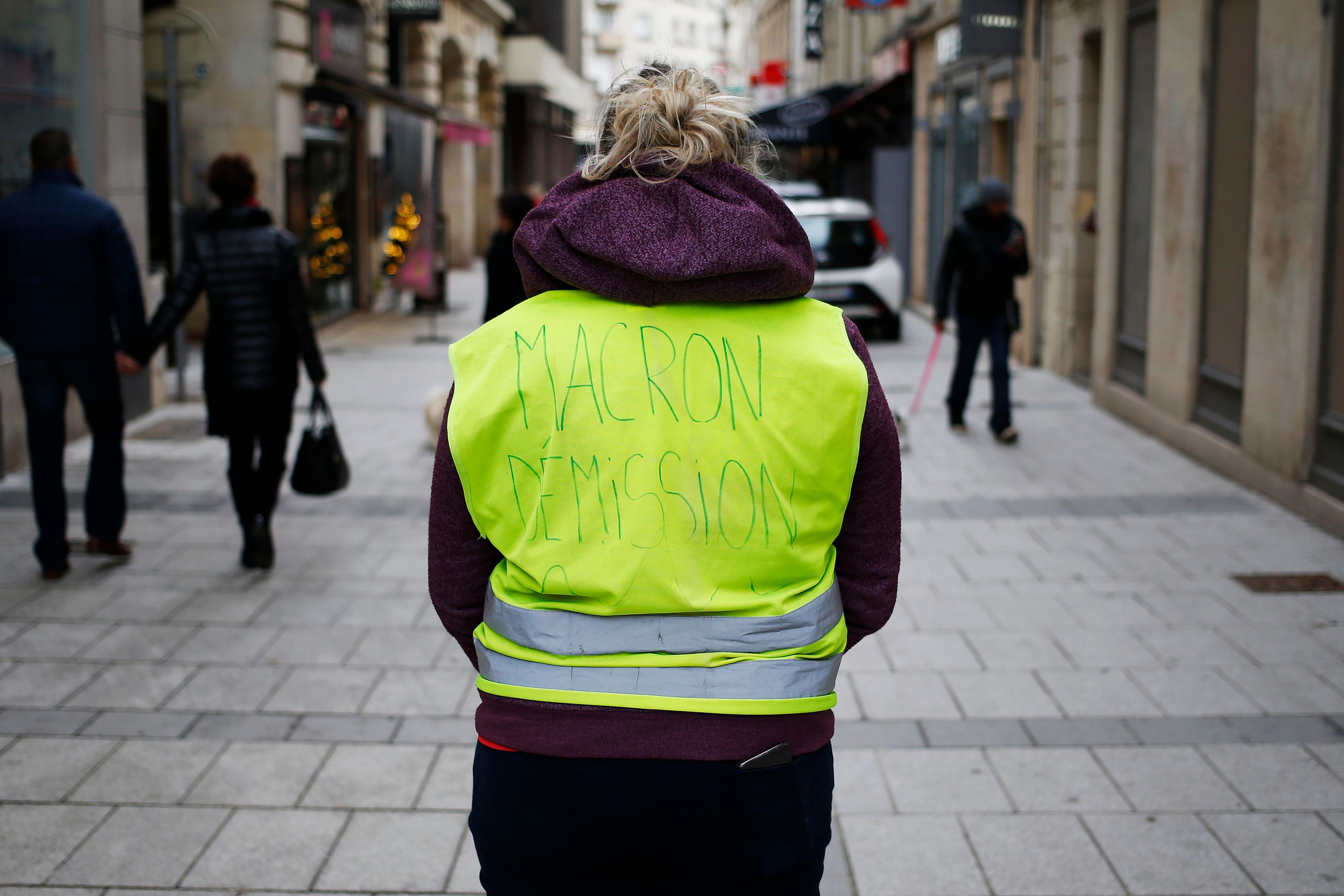 STRASBOURG, FRANCE - FEB 02, 2018: Rear view of adult woman with Louis  Vuitton backpack during protest of Gilets Jaunes Yellow Vest manifestation  anti-government demonstrations on Boulevard de Dresde Stock Photo - Alamy