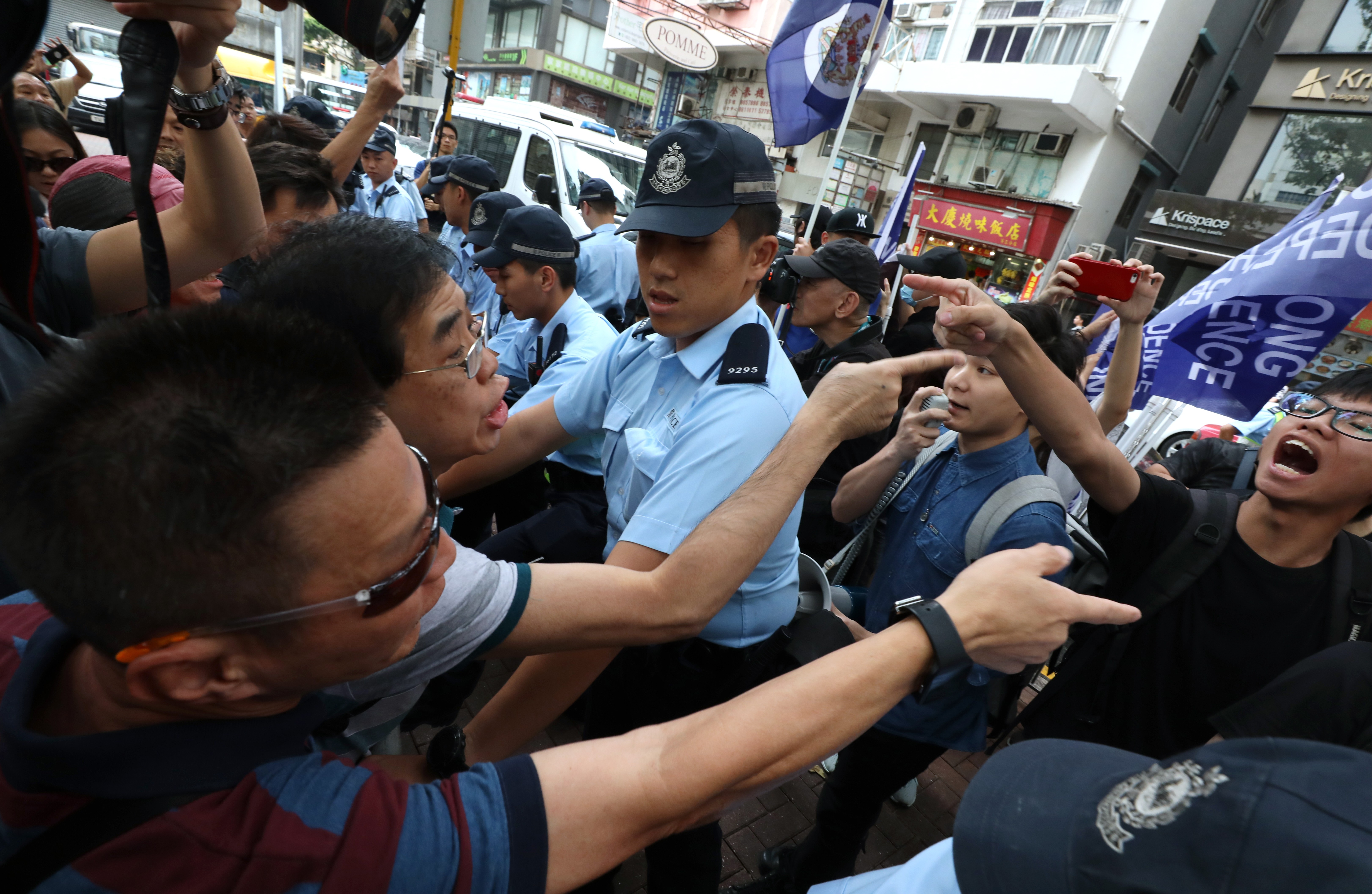 Demonstrators clash at a protest in Wan Chai on October 1, China’s National Day. Photo: Felix Wong