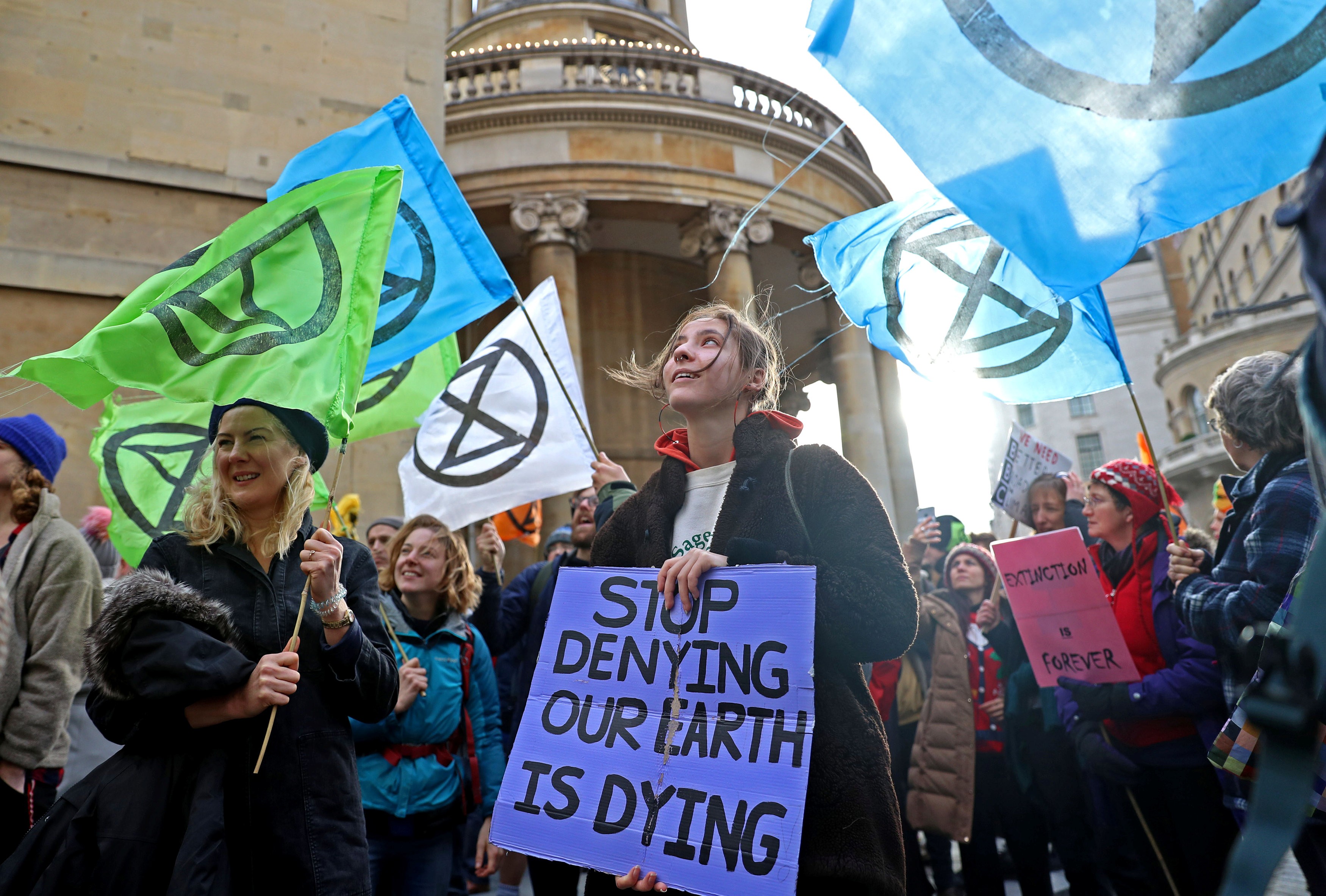 Protesters from the climate change pressure group Extinction Rebellion demonstrate outside the BBC offices in central London on December 21. They called on the broadcaster to give top priority to climate change and environmental issues, in both editorial coverage and corporate management. Photo: Reuters