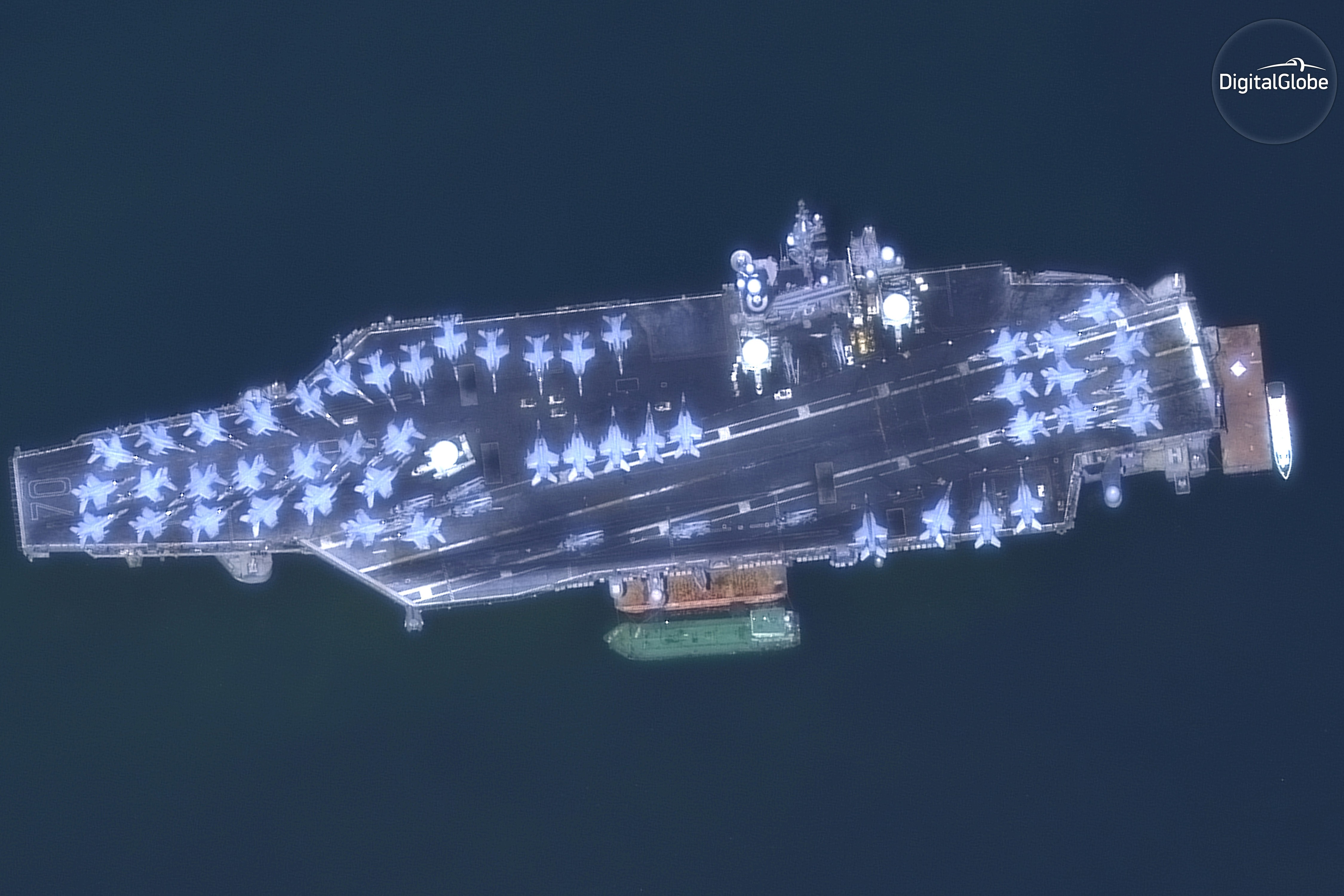 This March 6, 2018, satellite image provided by DigitalGlobe shows The USS Carl Vinson off the coast of Da Nang, Vietnam, its deck packed with warplanes. Photo: DigitalGlobe, a Maxar company via AP