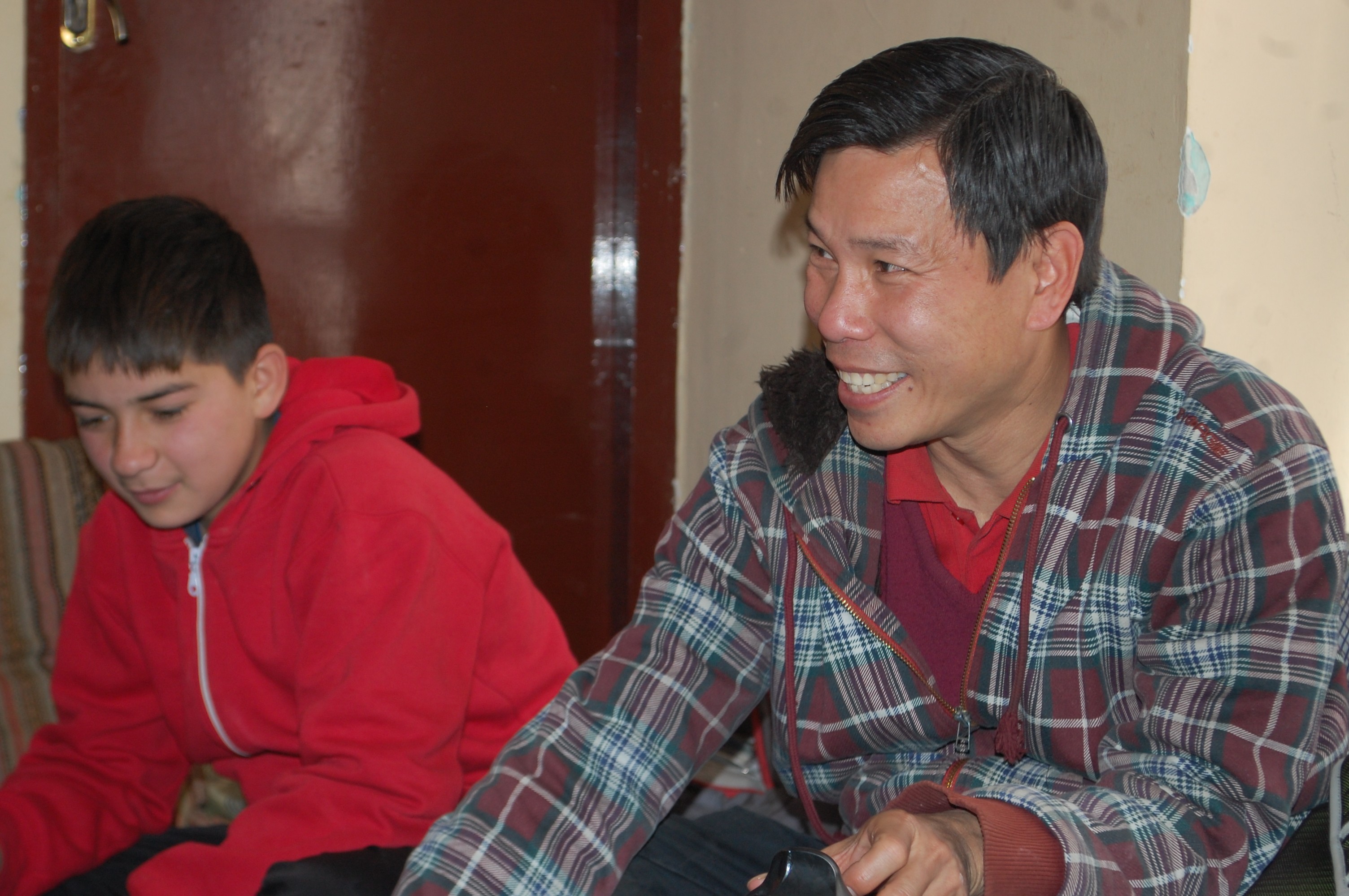 Dr Wee Teck Young with Inaam at the office of the Afghan Peace Volunteers. Photo: Ezzatullah Mehrdad