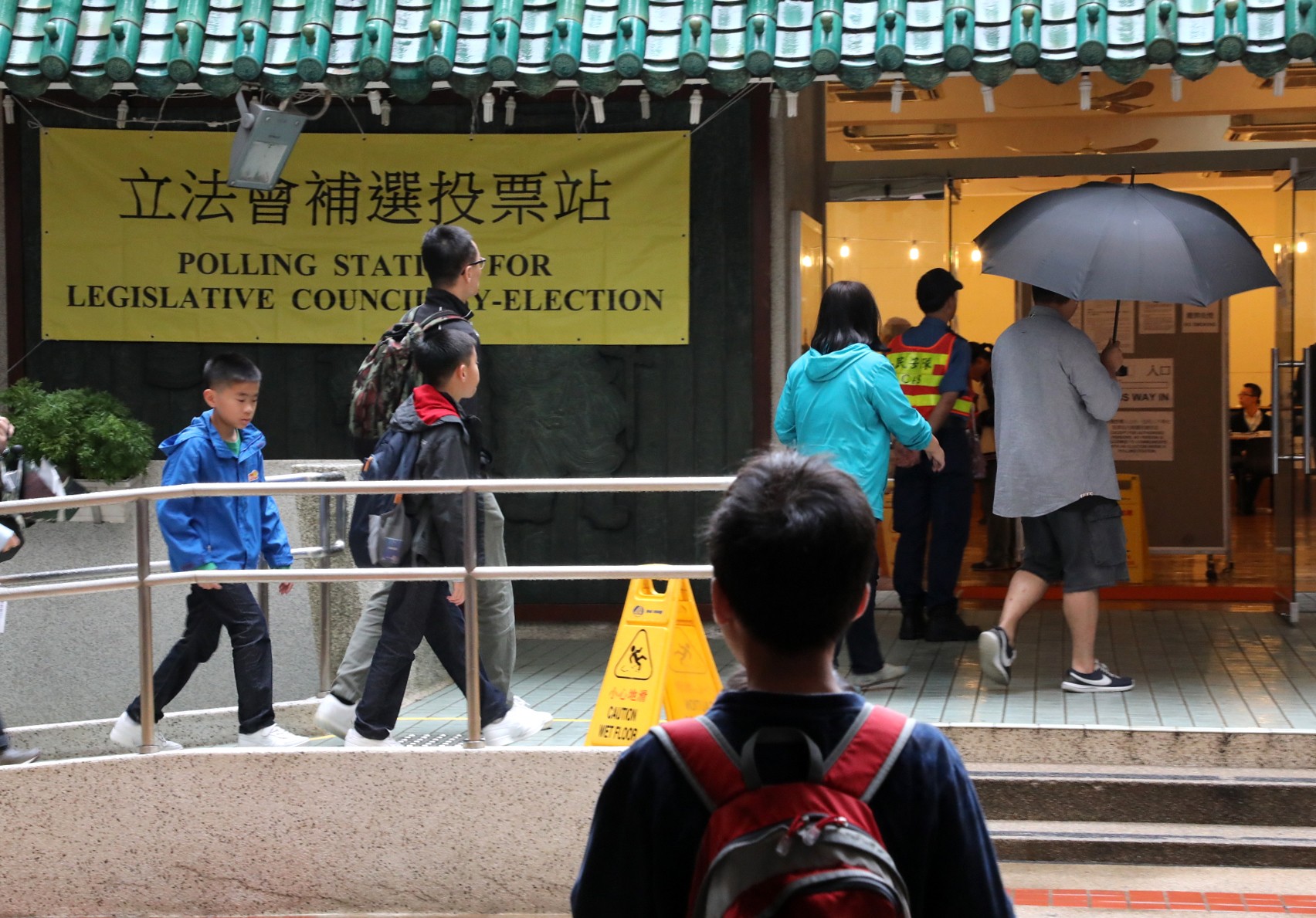 Voters arrive at a polling station for a Legislative Council by-election, in Mei Foo on November 25, 2018. Photo: Felix Wong