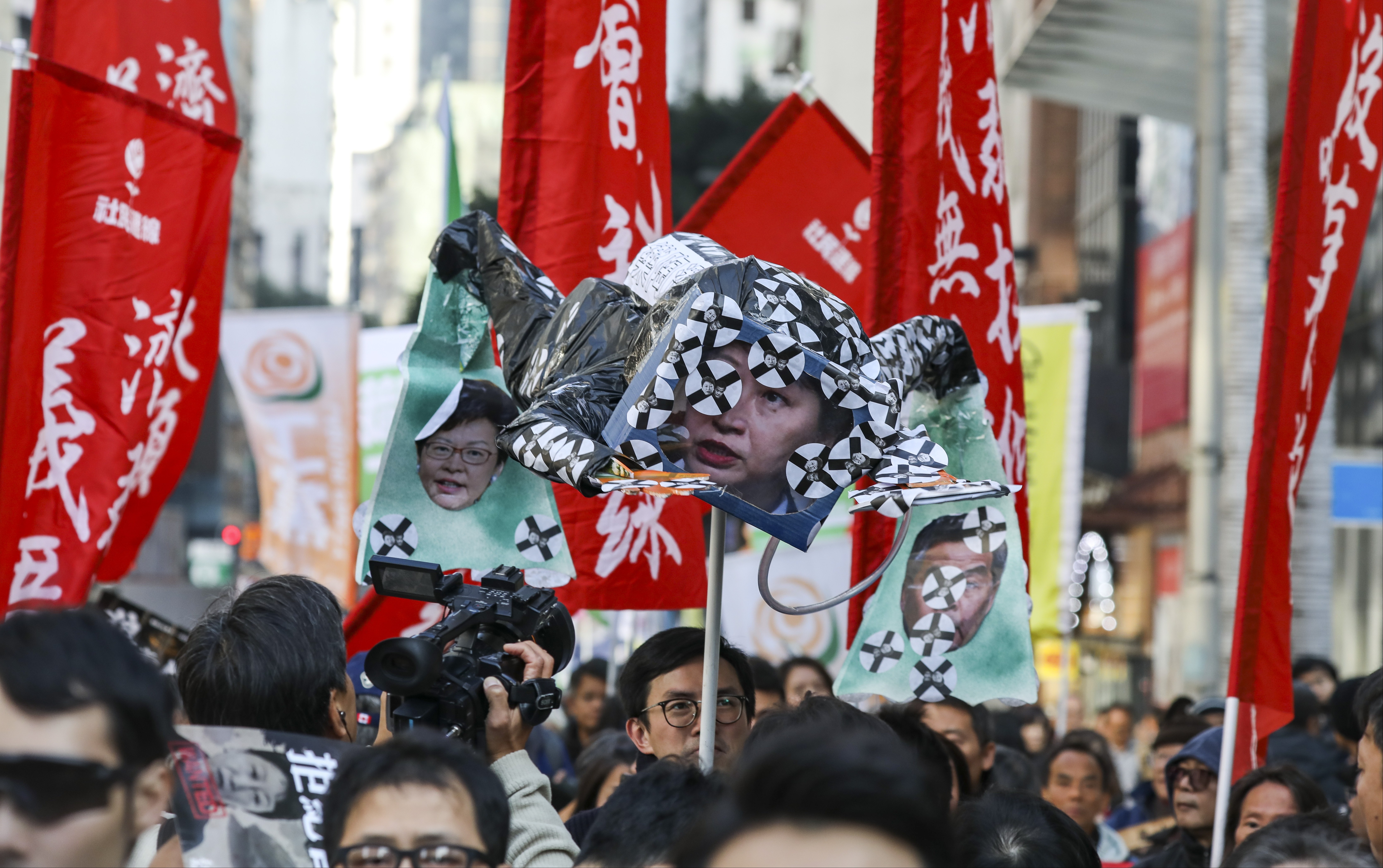 A prop featuring Secretary for Justice Teresa Cheng is seen at the New Year’s Day rally in Causeway Bay. Photo: Nora Tam