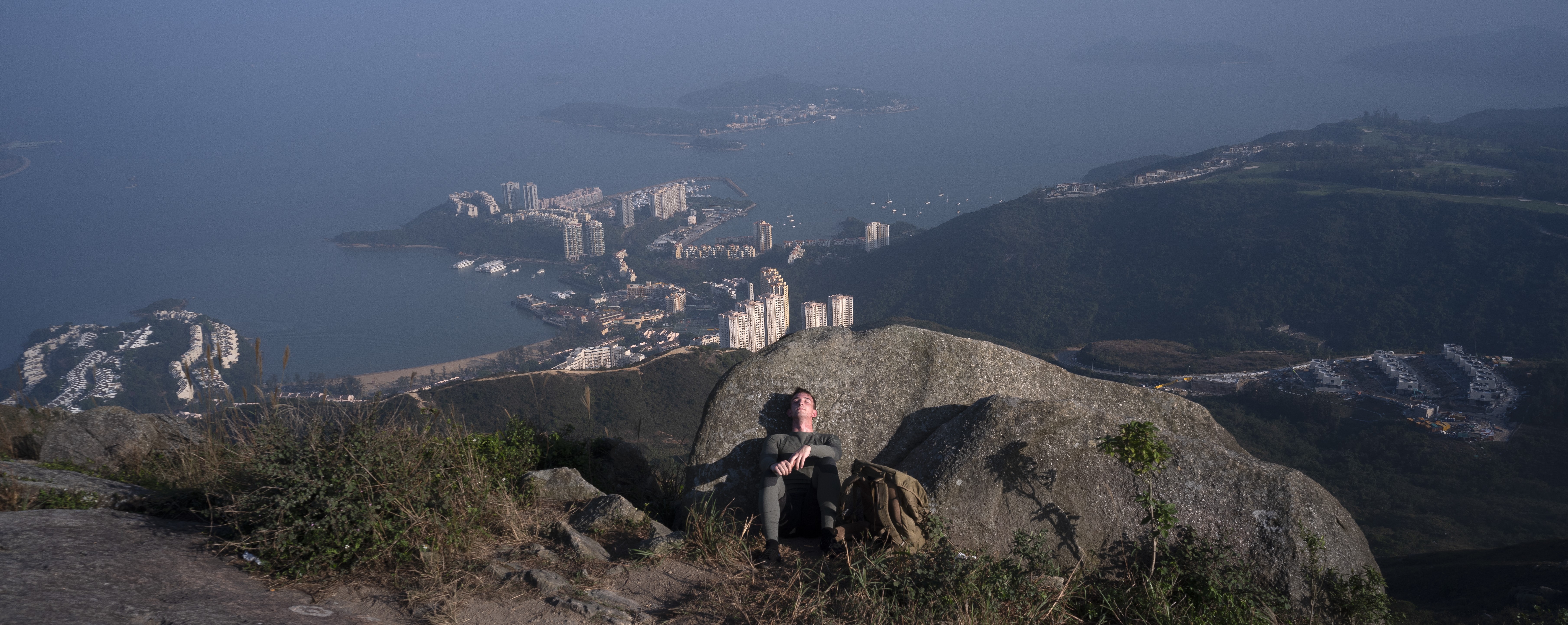 A hiker takes a breather on the popular Lo Fu Tau trail in Lantau North Country Park, with Discovery Bay and Peng Chau island seen in the distance. Chief Executive Carrie Lam announced in October her ambitious ‘Lantau Tomorrow Vision’, which proposes creating artificial islands spanning 1,700 hectares off the eastern coast of Lantau Island. Photo: Robert Ng