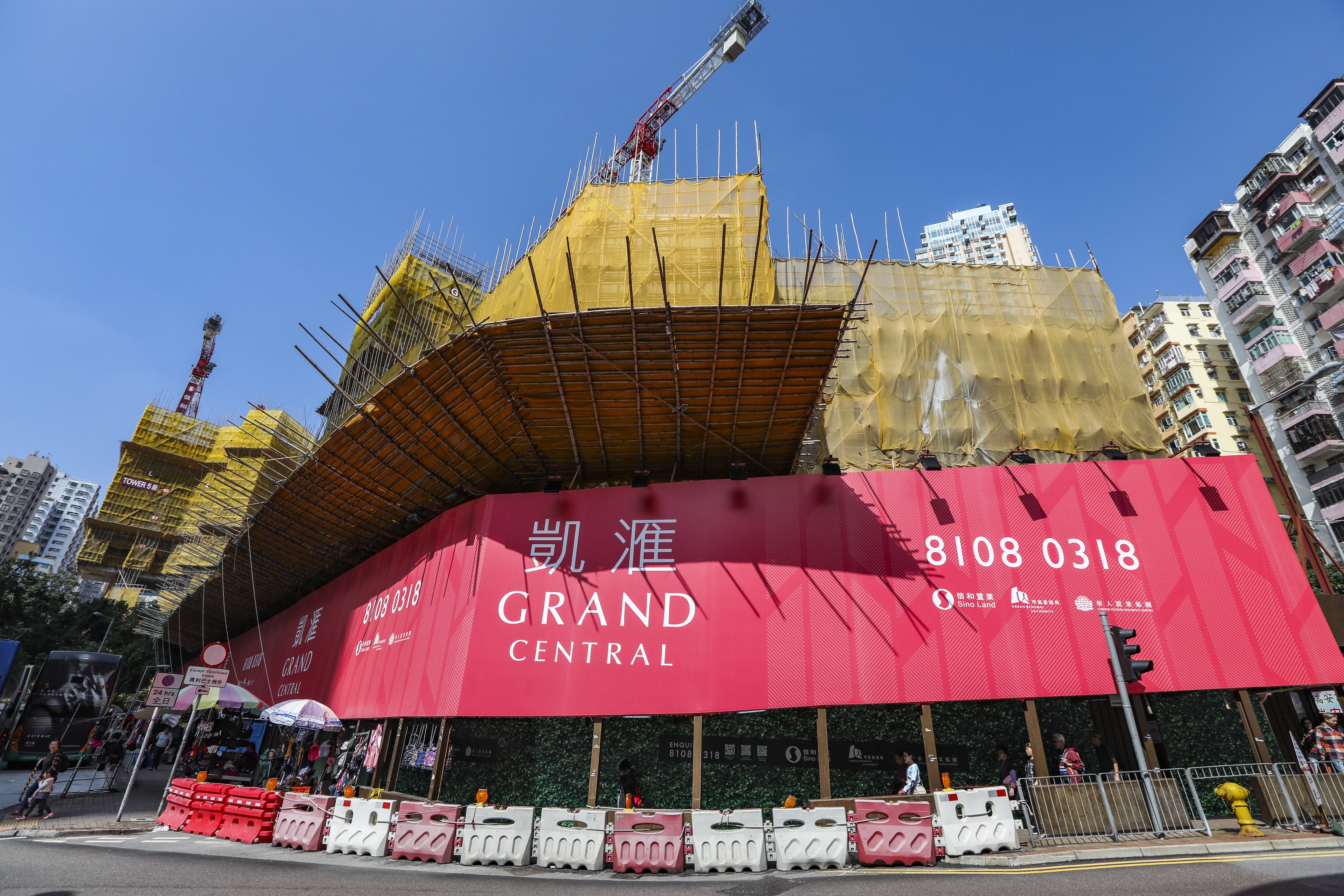 Relations between Sino Land and brokers had soured after the property developer said it would only pay 1.7 per cent commission for more than a 1,000 flats sold at its upcoming Grand Central housing development in Kwun Tong. Photo: Roy Issa