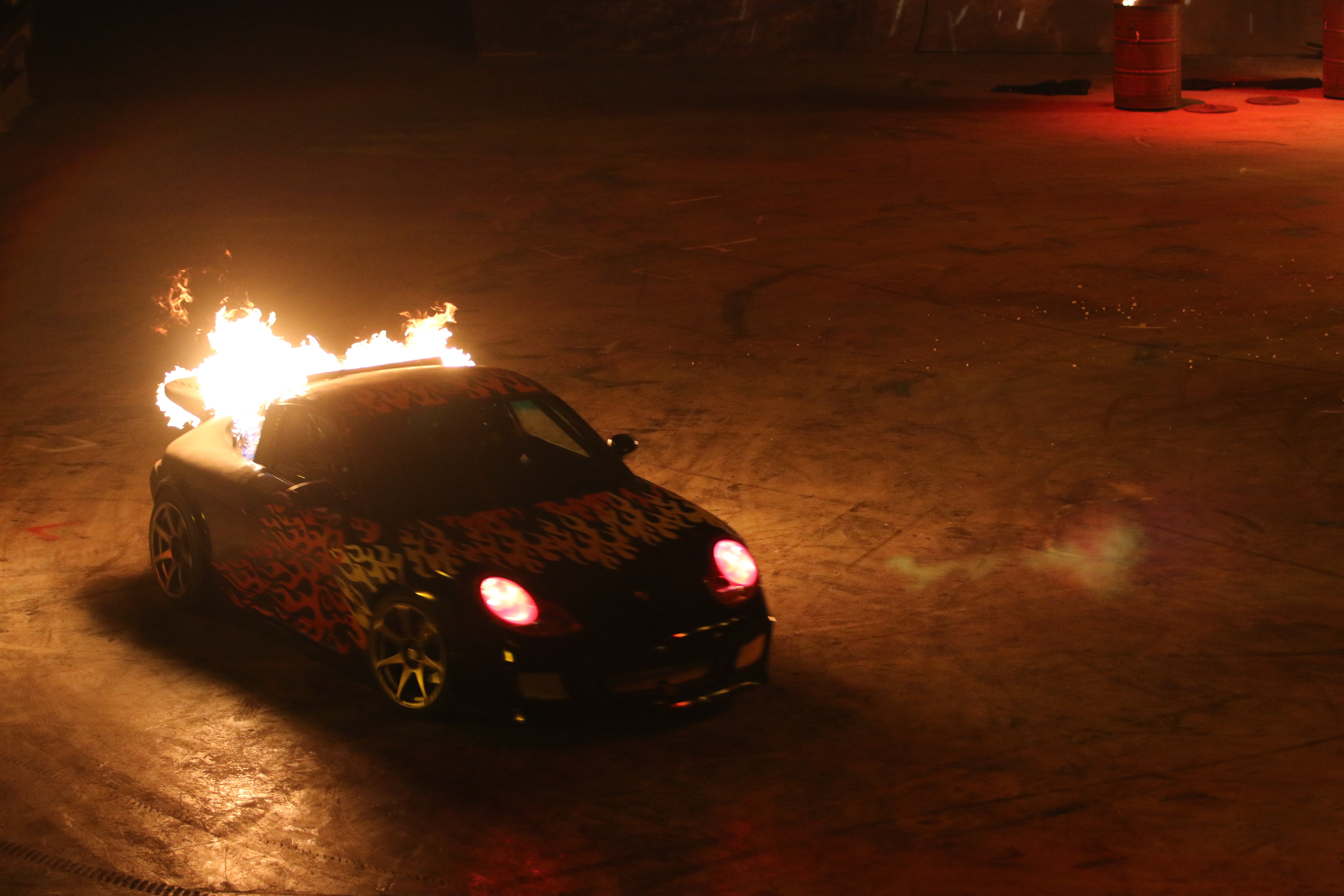 A car is set on fire in ‘Elekron’, Studio City’s new stunt show. Photos: Jeff Chen