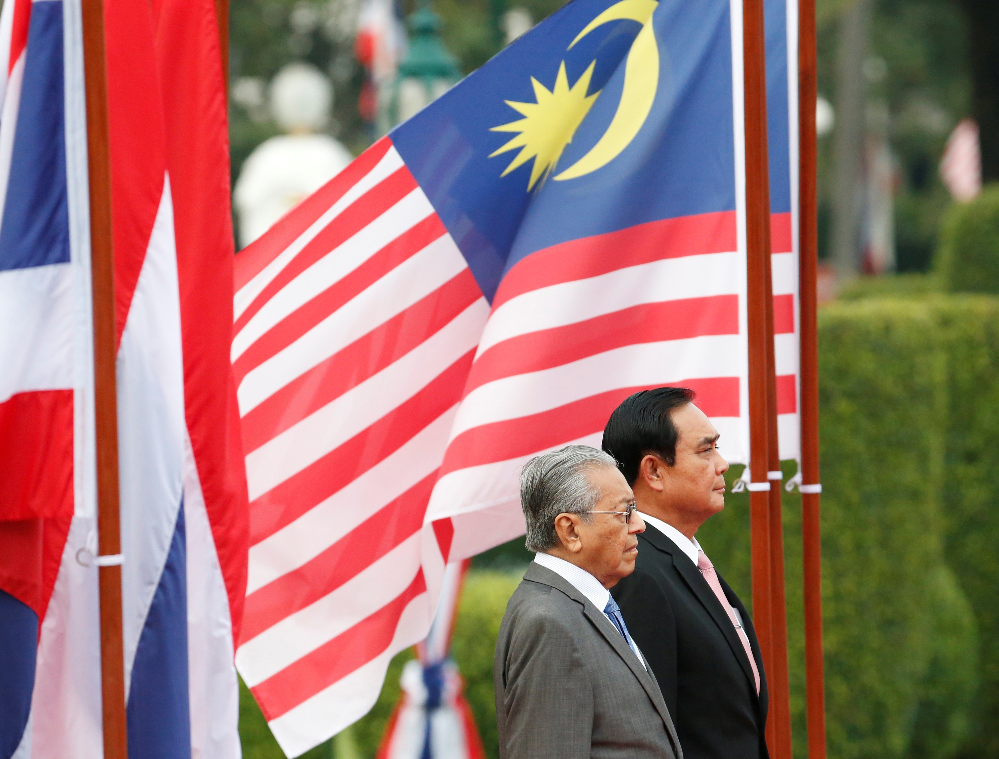 Malaysian Prime Minister Mahathir Mohamad and Thai Prime Minister Prayuth Chan-ocha. Photo: Reuters
