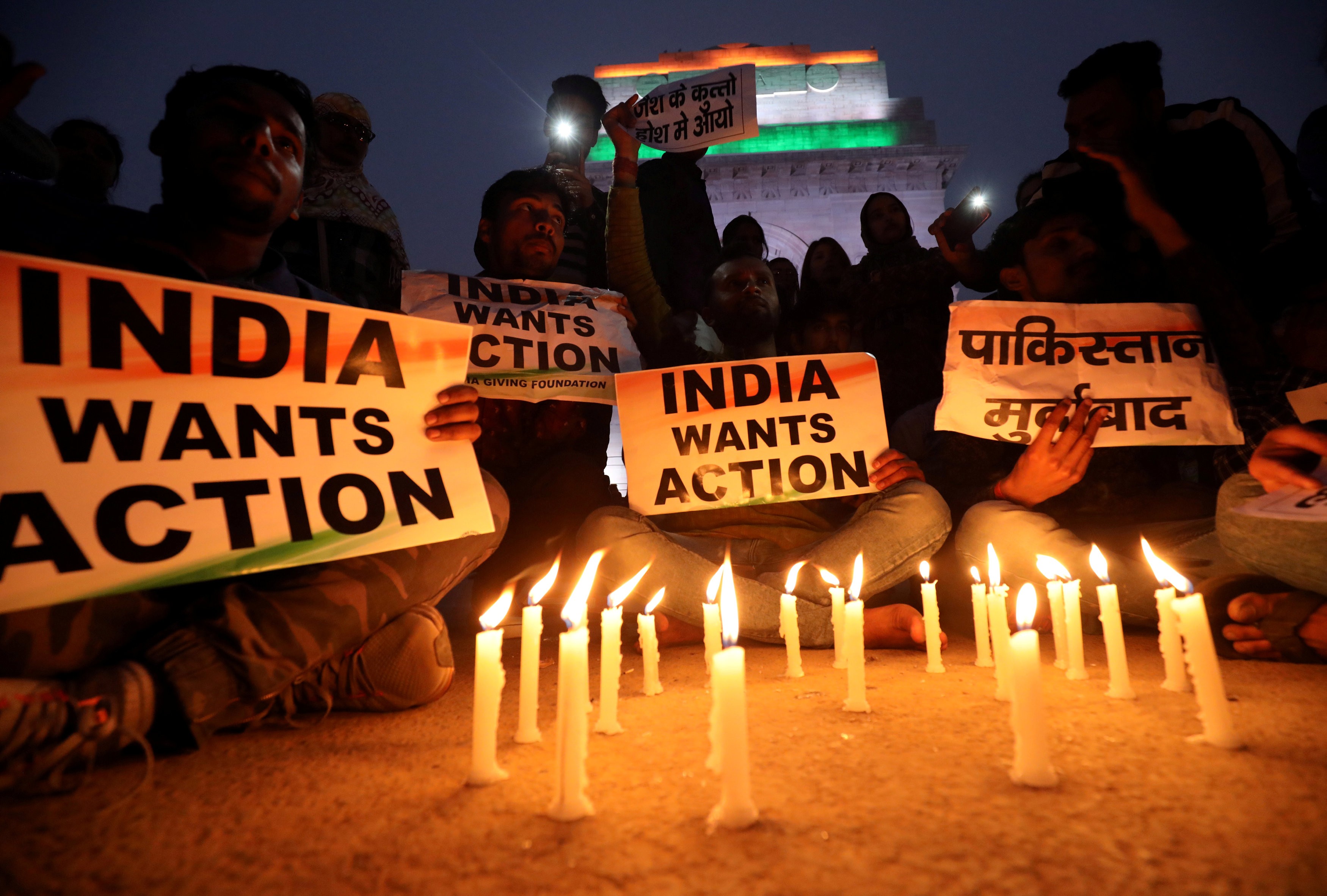 Demonstrators demand action at a candle light vigil held in India in the wake of the suicide bombing. Photo: Reuters