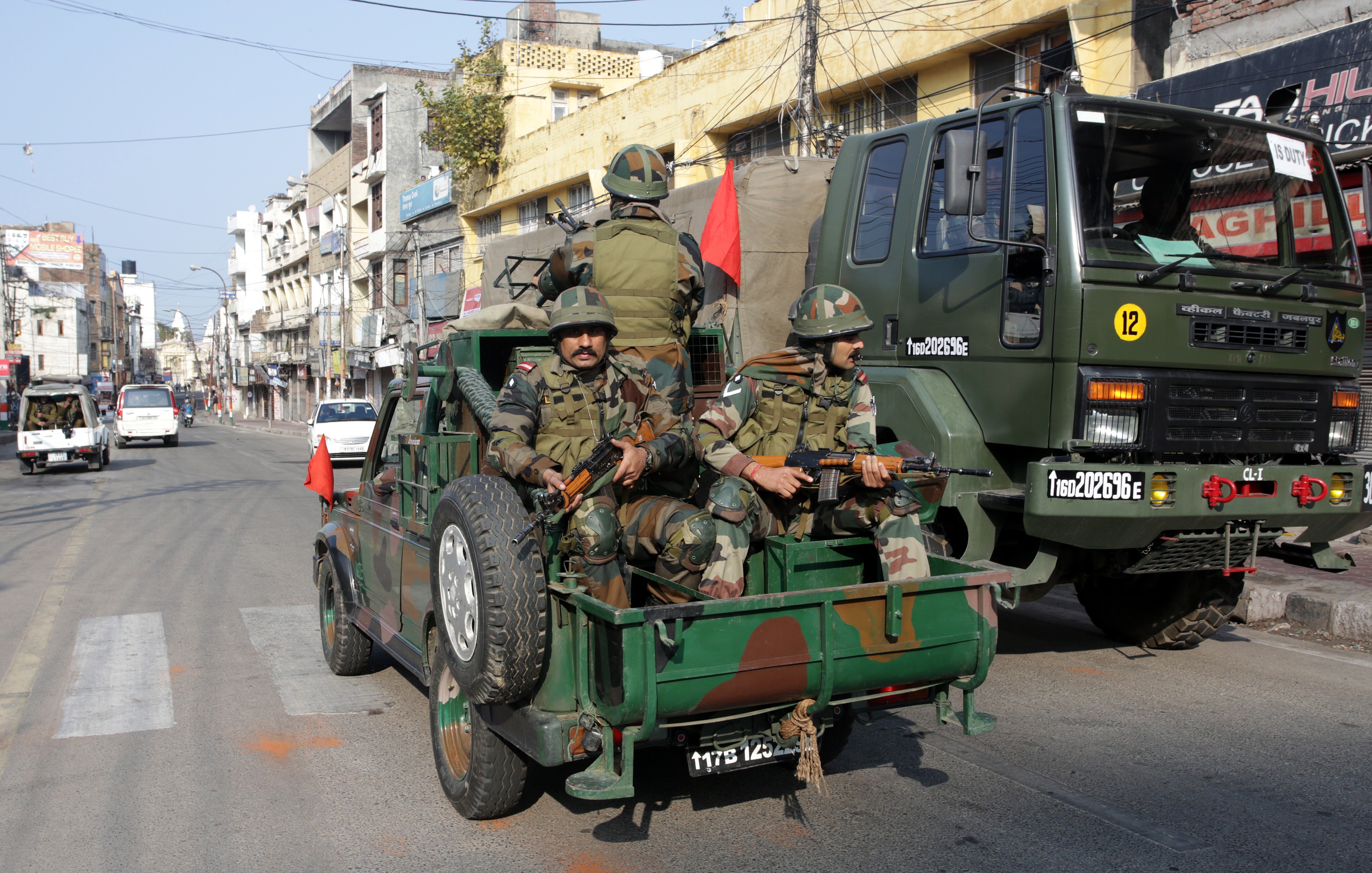 Indian army soldiers carry out a flag march in Jammu. Photo: EPA-EFE