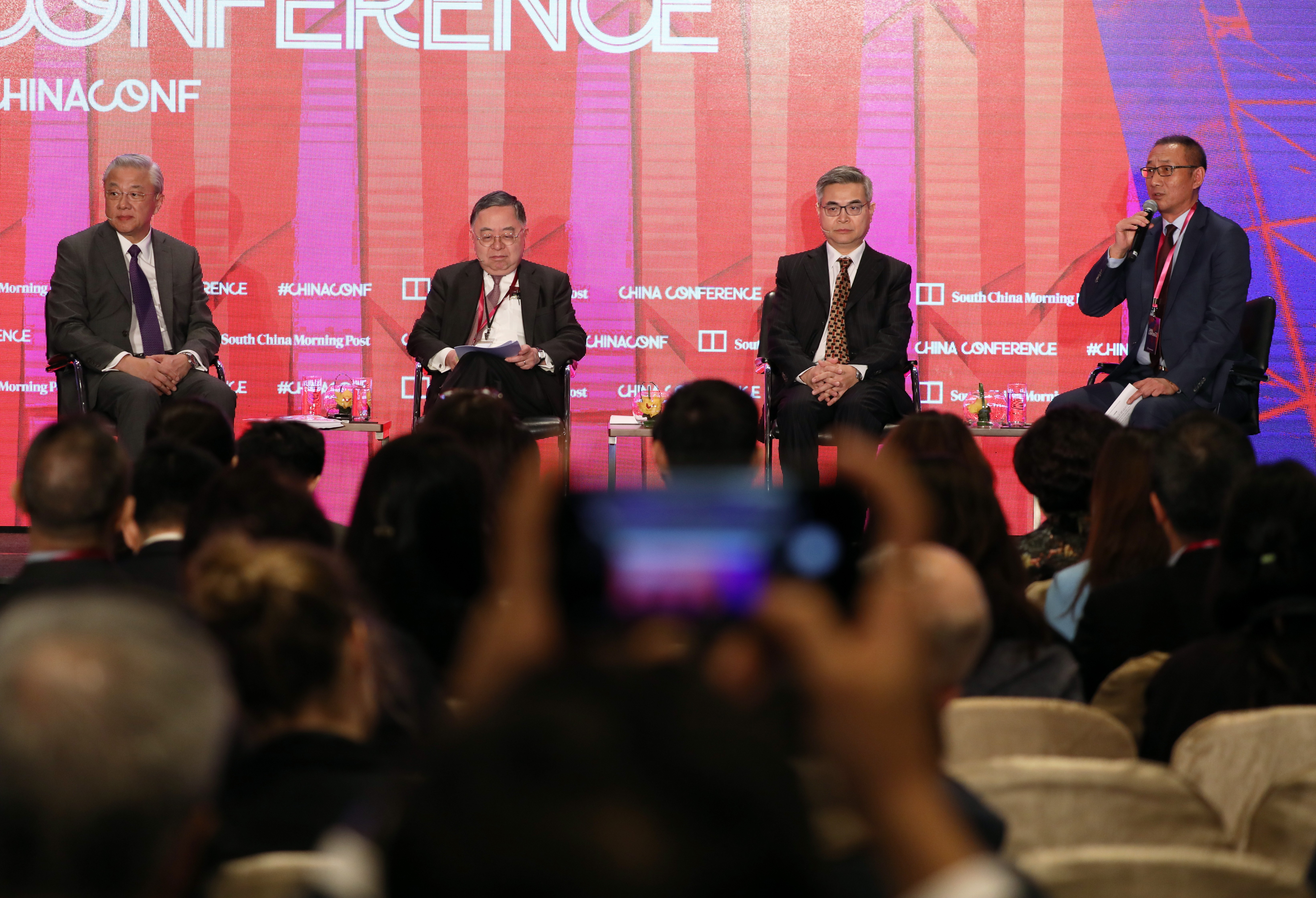(L-R): Professor of Practice, Peking University HSBC Business School, Professor of Practice in Business and Economics, the University of Hong Kong, Professor Geng Xiao; Chairman, Hang Lung Properties, Ronnie Chan; President, America China Public Affairs Institute, Fred Teng; and Editorial Advisor at SCMP, Wang Xiang-wei, at the SCMP China Conference at JW Marriott Hotel in Admiralty. 21FEB19 SCMP / Nora Tam