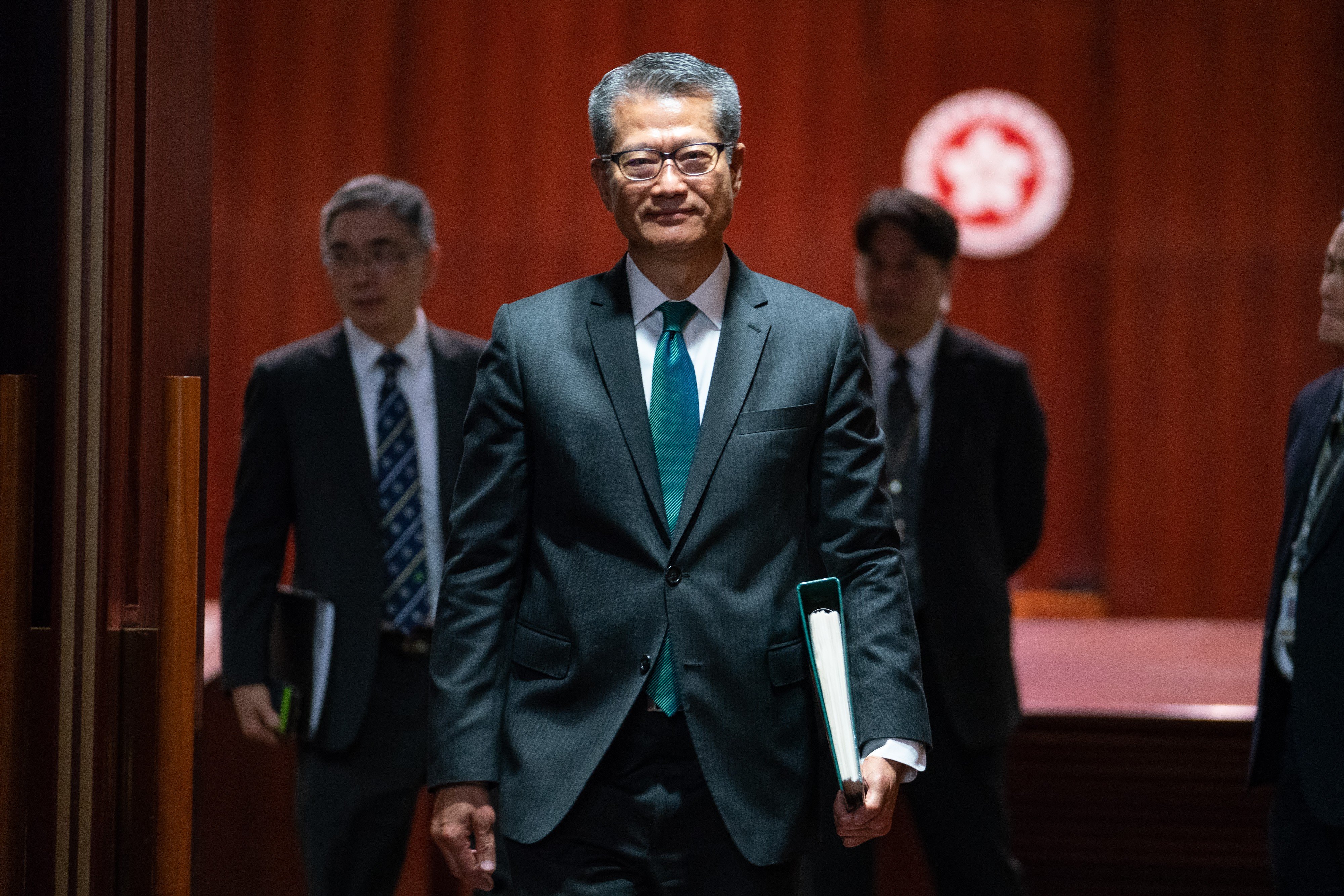 Hong Kong finance chief Paul Chan is under fire from critics who say his budget does little to ease the city’s notorious housing crunch. Photo: Bloomberg