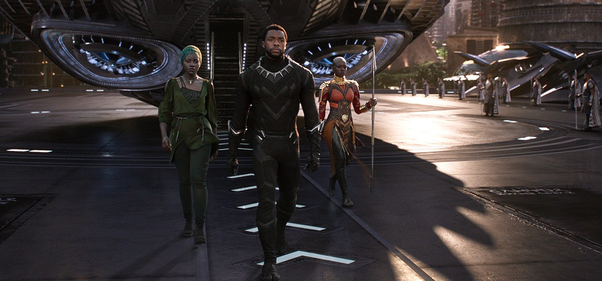 Actor Chadwick Boseman (centre) as T’Challa, the king of the fictitious African nation of Wakanda, who becomes superhero Black Panther, in a scene from the film, ‘Black Panther’. Photo: Disney/TNS