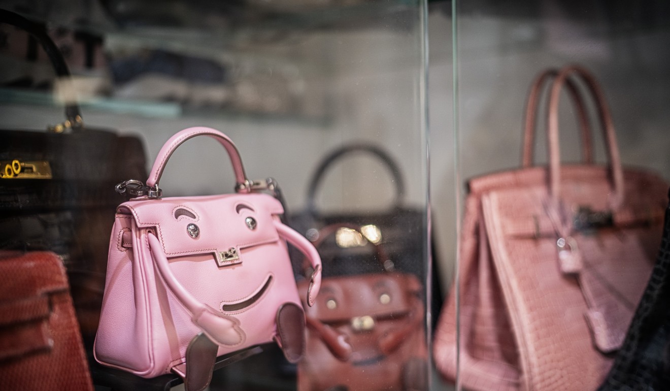 Pink crocodile skin handbag becomes world's most expensive at £150k HK  auction