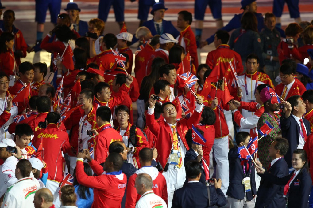 Chinese athletes parade during the closing ceremony. Photo: Xinhua