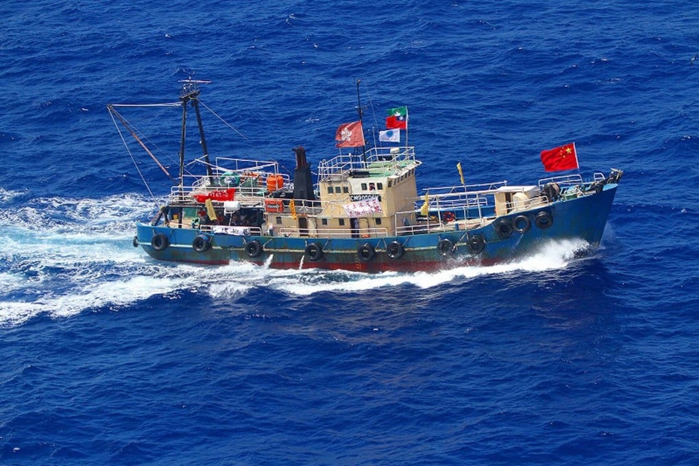 An image of the Hong Kong vessel Kai Fung No 2 as it approaches the Diaoyu Islands yesterday. Activists on board landed on one of the disputed islands and planted a Chinese flag. Photo: AFP