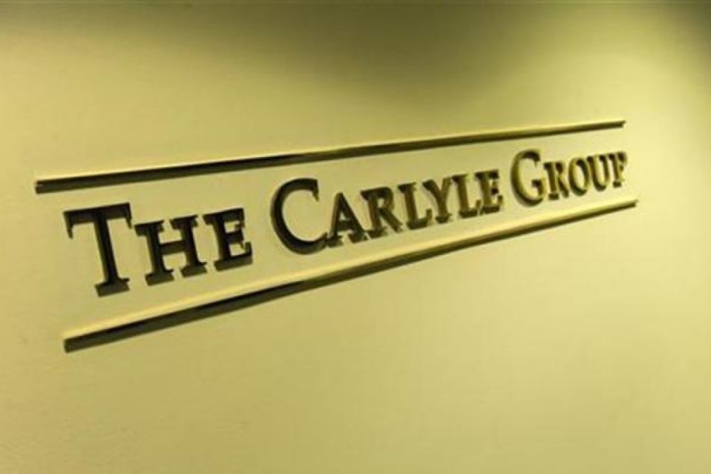 A general view of the lobby outside of the Carlyle Group offices in Washington, May 3, 2012. REUTERS/Jonathan Ernst