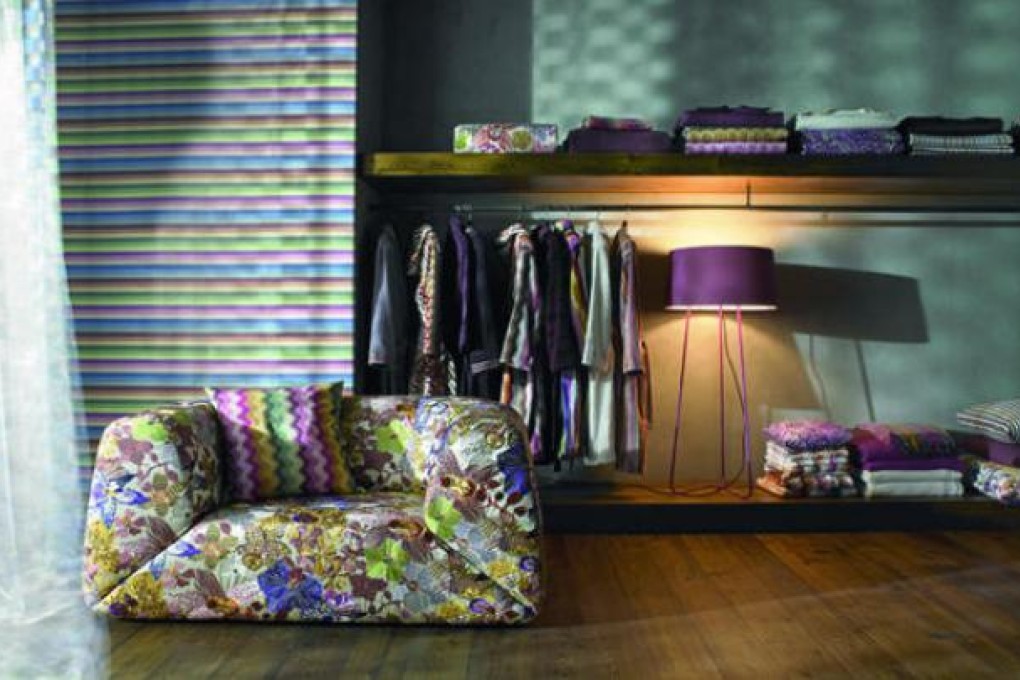 Bold patterns are back in vogue, but avoid putting all the pieces together on one side of the room.