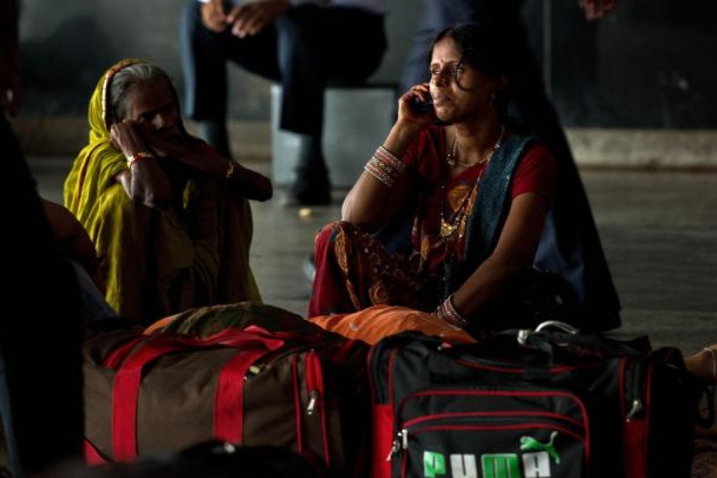 Of 950 million phone users, 35 per cent are in rural areas. Photo: AFP