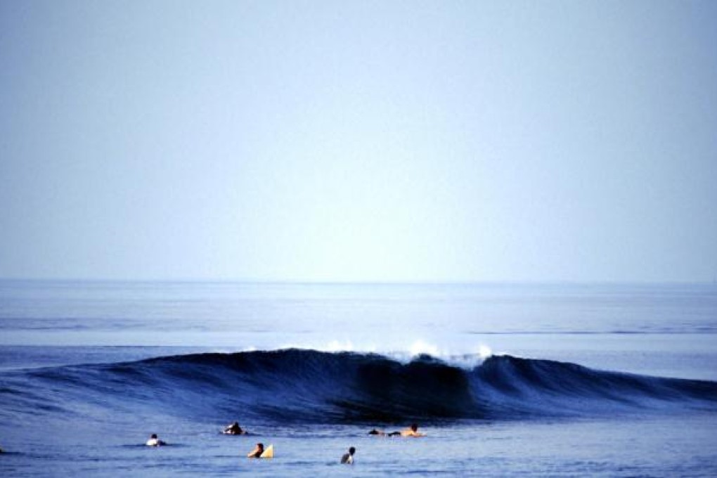 The beaches of the Maldives offer world-class waves for surfers of all abilities.Photo: Alf Alderson