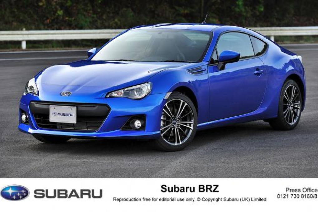 The BRZ hasan aluminium bonnet, bulging front wheel arches, distinctive headlights,air vents and a smart hexagonal lower grille.