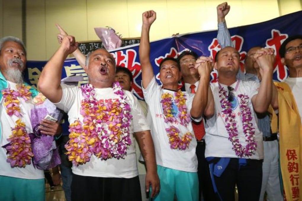 Activists (from left) Koo Sze-yiu, "Bull" Tsang Kin-shing, Ng Shek-yiu, Fang Xiaosong and Lo Chung-cheong arrive at Hong Kong Airport. Photo: Sam Tsang
