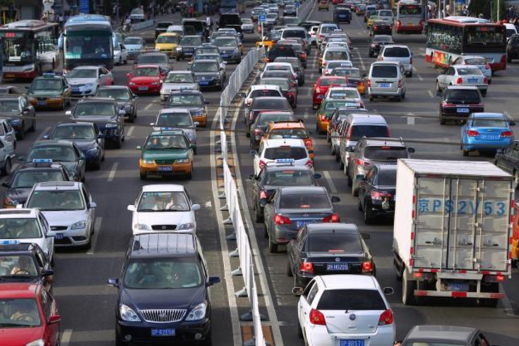 Despite Beijing's traffic gridlocks, more than a million residents are still waiting to get a license plate by the end of last month. Photo: Simon Song