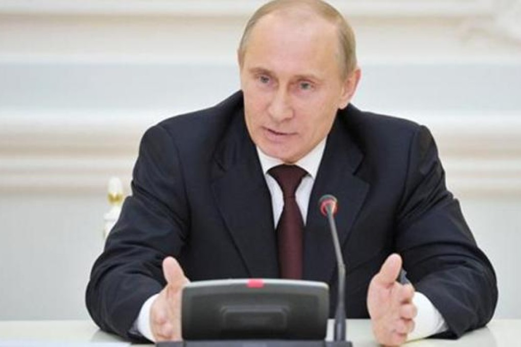 Russia's Prime Minister and President-elect Vladimir Putin attends a meeting with members of the United Russia party in Moscow April 24, 2012. REUTERS/Alexei Nikolsky