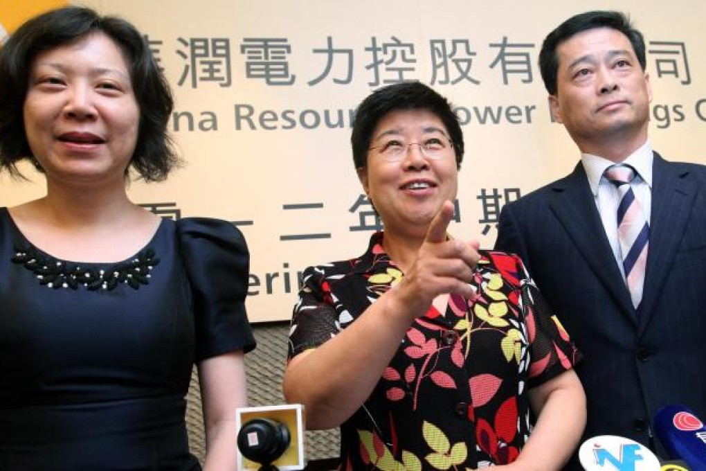 (From left) China Resources Power chief financial officer Wang Xiaobin, chairwoman Zhou Junqing and president Wang Yujun. Photo: May Tse