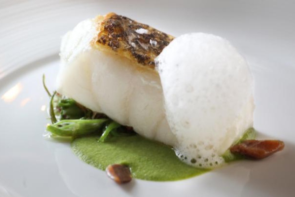 Chilean sea bass with green bean sauce. Photo: Felix Wong