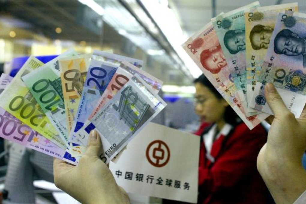 With the private sector less keen to convert foreign currency, yuan supply is tightening. Photo: Reuters